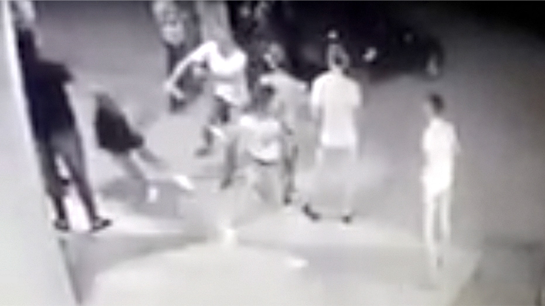 Surveillance video shows a Brazilian woman celebrating her birthday gunned down outside the party in an apparent gang retaliation attack.