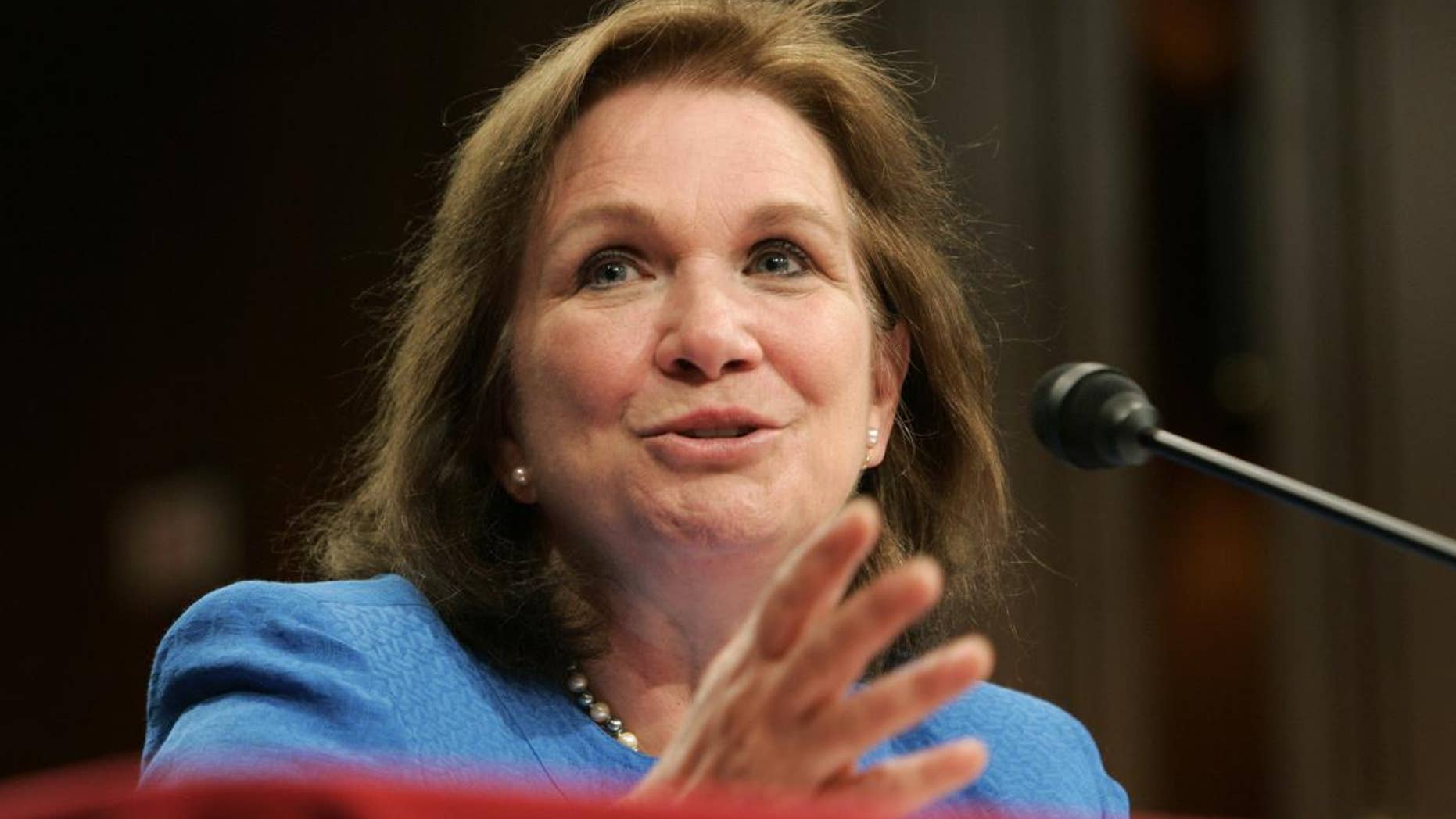 FILE - In this May 8, 2008 file photo, Elizabeth Edwards, then wife of former Democratic presidential hopeful Sen. John Edwards, D-N.C., testifies before the Senate Health, Education, Labor, and Pensions committee hearing on the challenges and opportunities for fighting cancer on Capitol Hill in Washington. Edwards died Tuesday. (AP Photo/Susan Walsh, File)