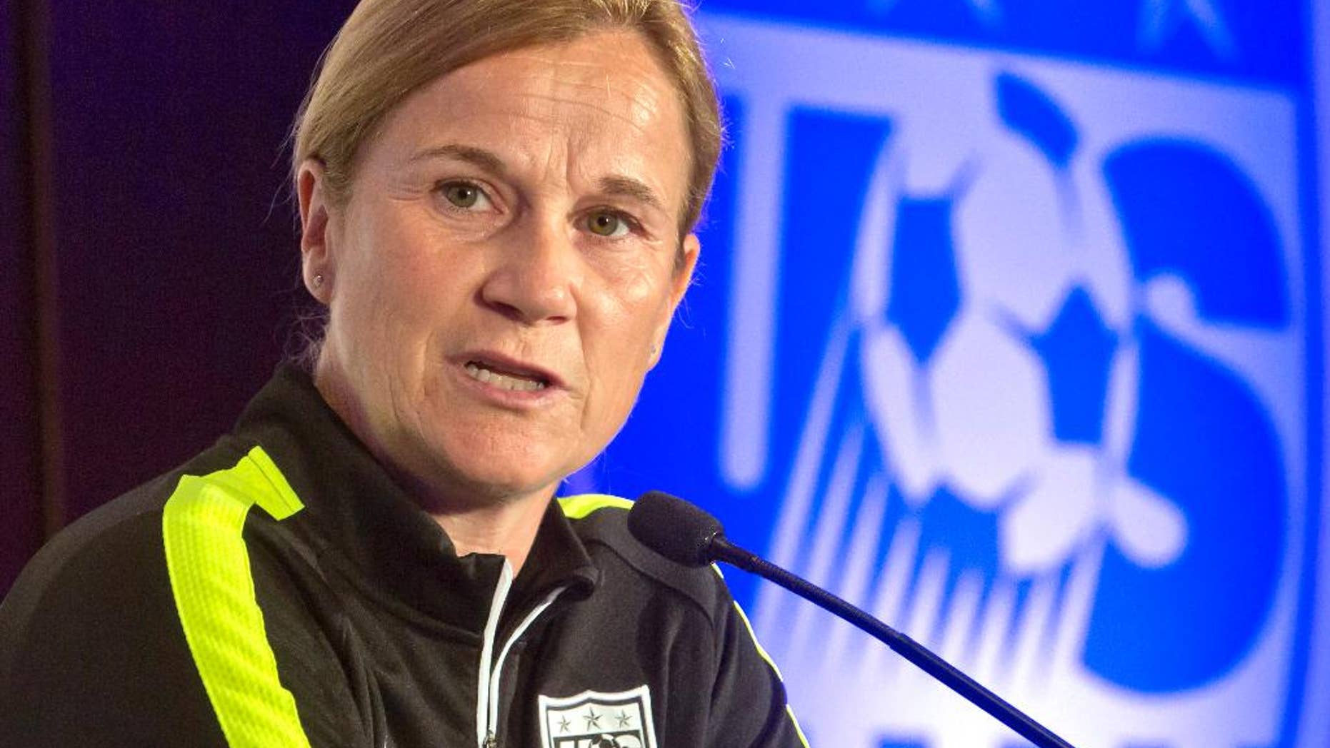 FILE - In this May 27, 2015, file photo, U.S. women's soccer head coach Jill Ellis speaks during the U.S. Women's National Team World Cup media day in New York. Ellis has been rewarded for leading the U.S. women to the World Cup title with a contract extension. The U.S. Soccer Federation said Wednesday, Aug. 5, 2015, that Ellis had agreed to a multi-year extension. That leaves Ellis in charge as the Americans prepare for next year's Olympics in Rio de Janeiro. (AP Photo/Bebeto Matthews, File)