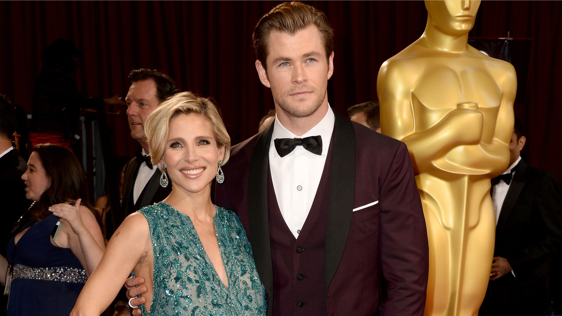 HOLLYWOOD, CA - MARCH 02: Actors Elsa Pataky (L) and Chris Hemsworth attend the Oscars held at Hollywood & Highland Center on March 2, 2014 in Hollywood, California. (Photo by Frazer Harrison/Getty Images)