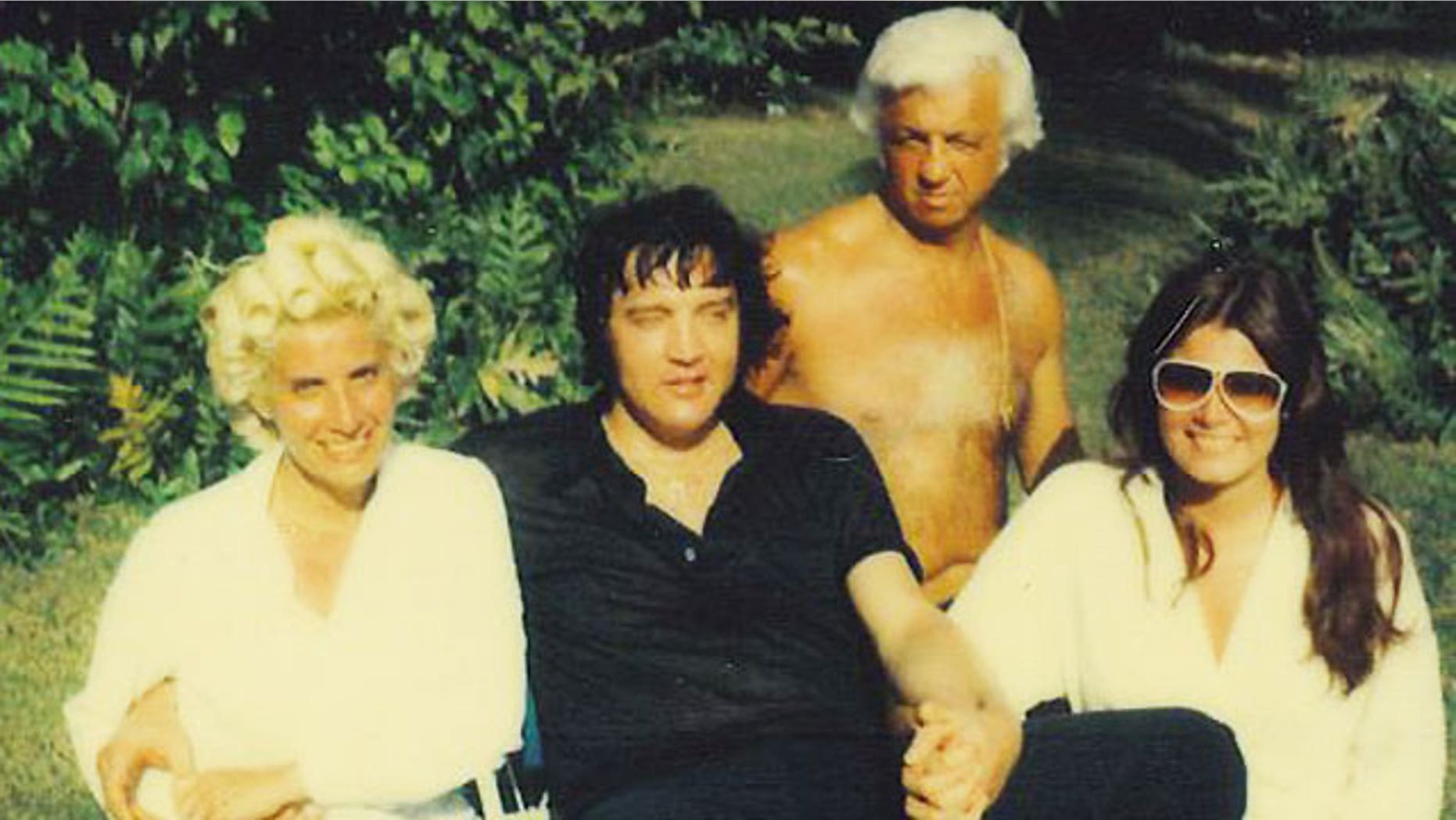 A photo of Elvis (center) with his doctor Nick Nichopoulos (back) taken shortly before his death.