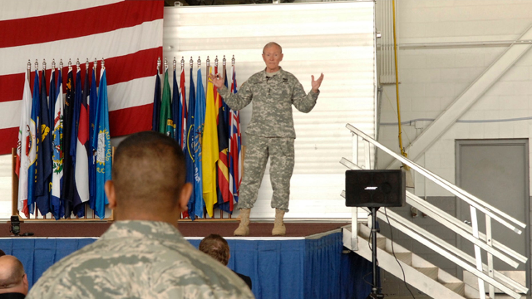 June 17, 2013: Army Gen. Martin Dempsey, the chairman of the Joint Chiefs of Staff, speaks with soldiers at Minot airforce base in Minot, N.D.