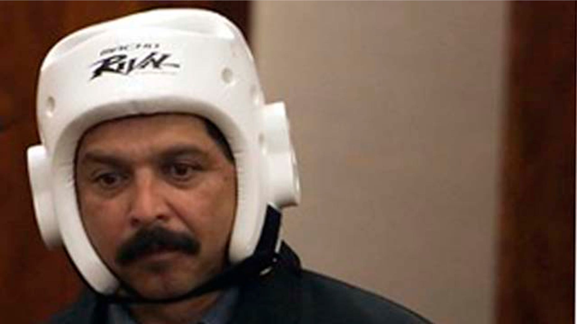 FILE - In this March 13, 2009 file photo, Tejano music star Emilio Navaira, right, makes a court appearance in Houston, Texas, for a misdemeanor charge of driving while intoxicated when he crashed his tour bus in 2008. Navaira, who has pleaded guilty to the charge, told jurors in a civil lawsuit brought by a former band member in San Antonio Wednesday, Jan. 5, 2011, that he has trouble remembering his own lyrics since crash left him with head injuries. (AP Photo/Sharon Steinmann, Pool)