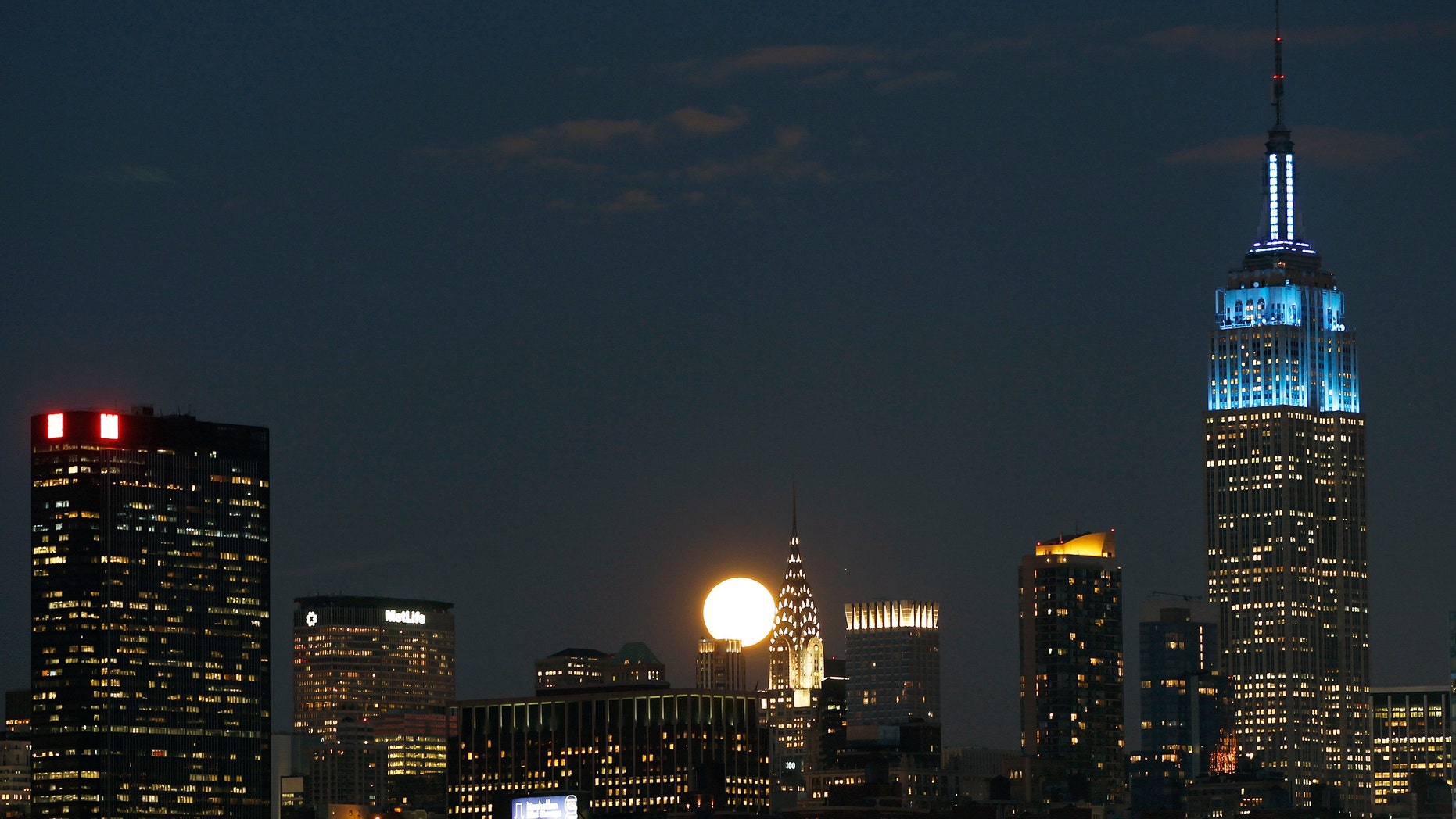 Feb. 7: A full moon rises between the Chrysler Building and the Empire State Building.