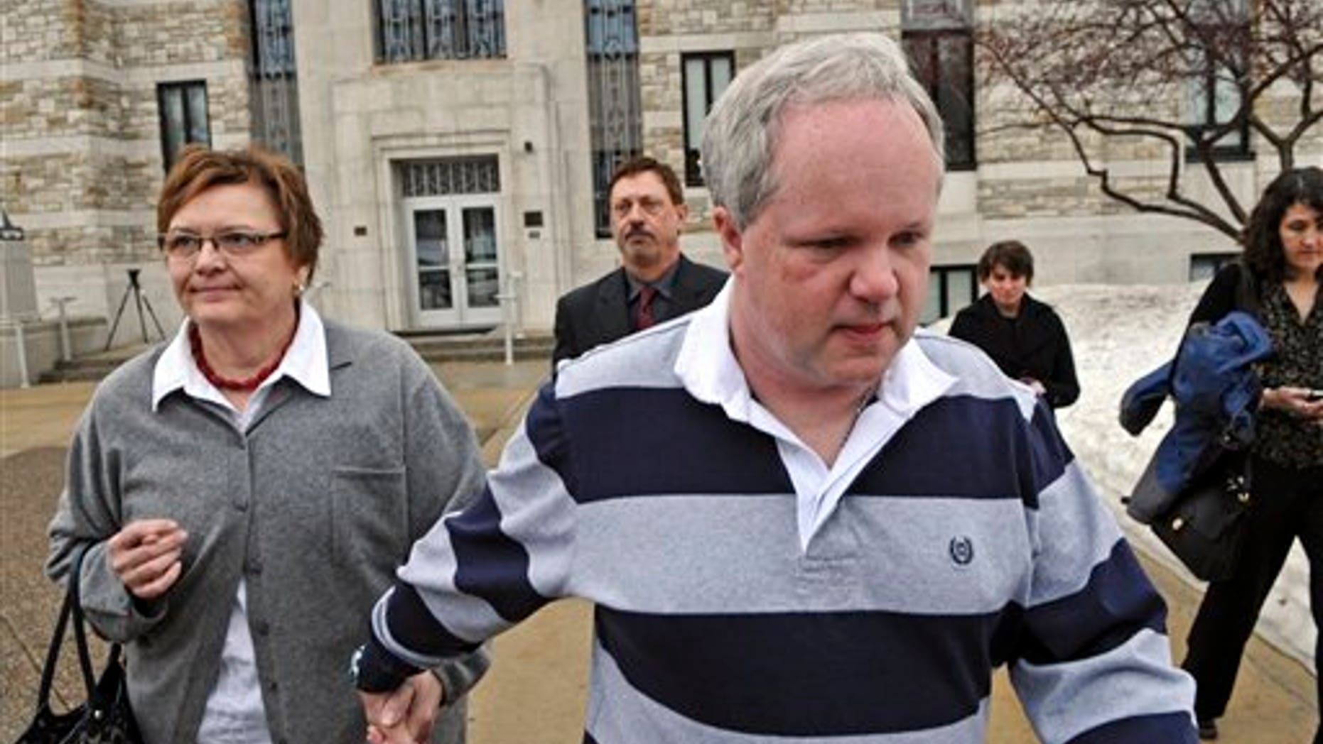 Feb. 17: William Melchert-Dinkel leaves the Rice County Courthouse holding hands with his wife, Joyce Melchert-Dinkel, after waiving his right to a jury trial in Faribault, Minn. (AP/Star Tribune)