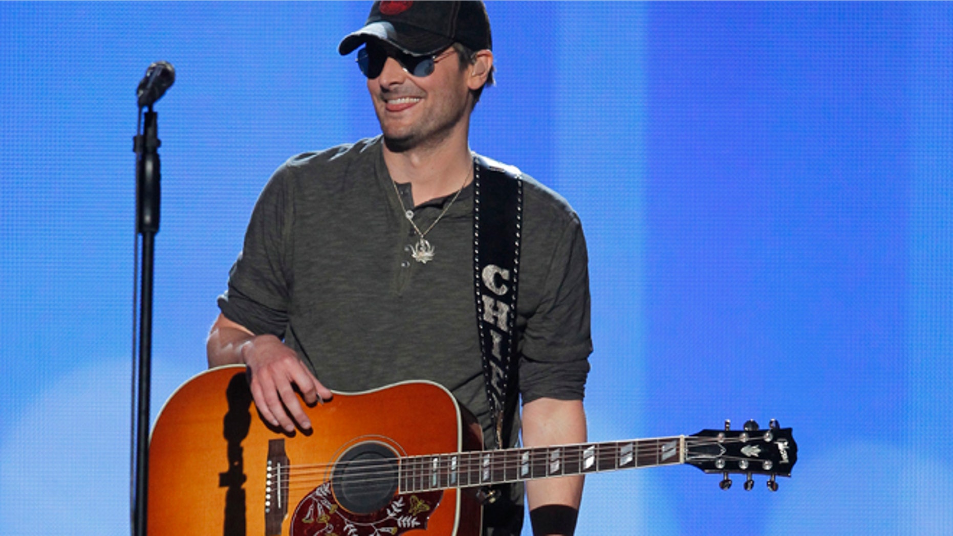 Singer Eric Church smiles after performing "Springsteen" at the 47th annual Academy of Country Music Awards in Las Vegas, Nevada, April 1, 2012.