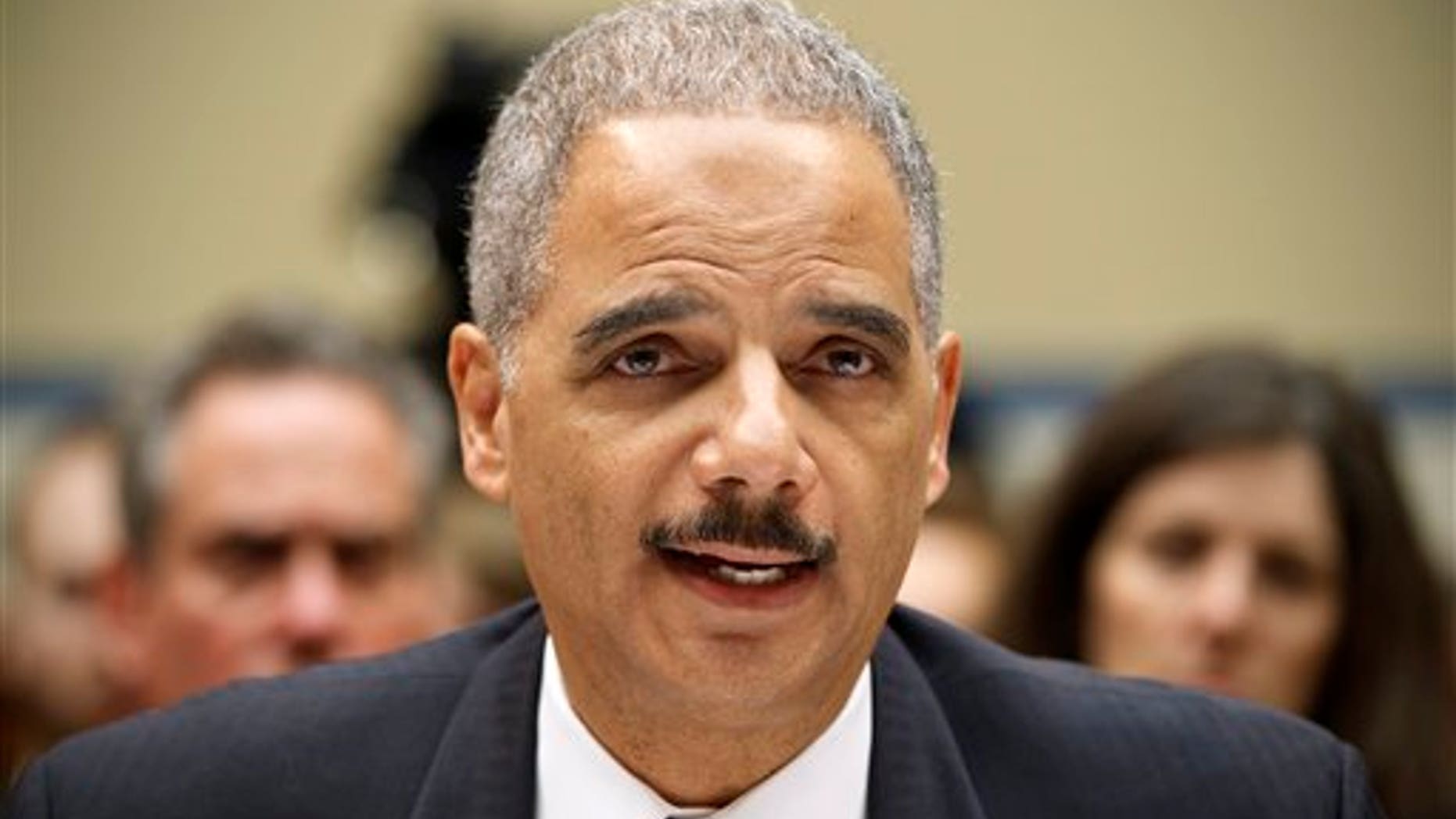 Feb. 2, 2012: Attorney General Eric Holder testifies on Capitol Hill in Washington before the House Oversight and Government Reform Committee hearing on "Operation Fast and Furious."