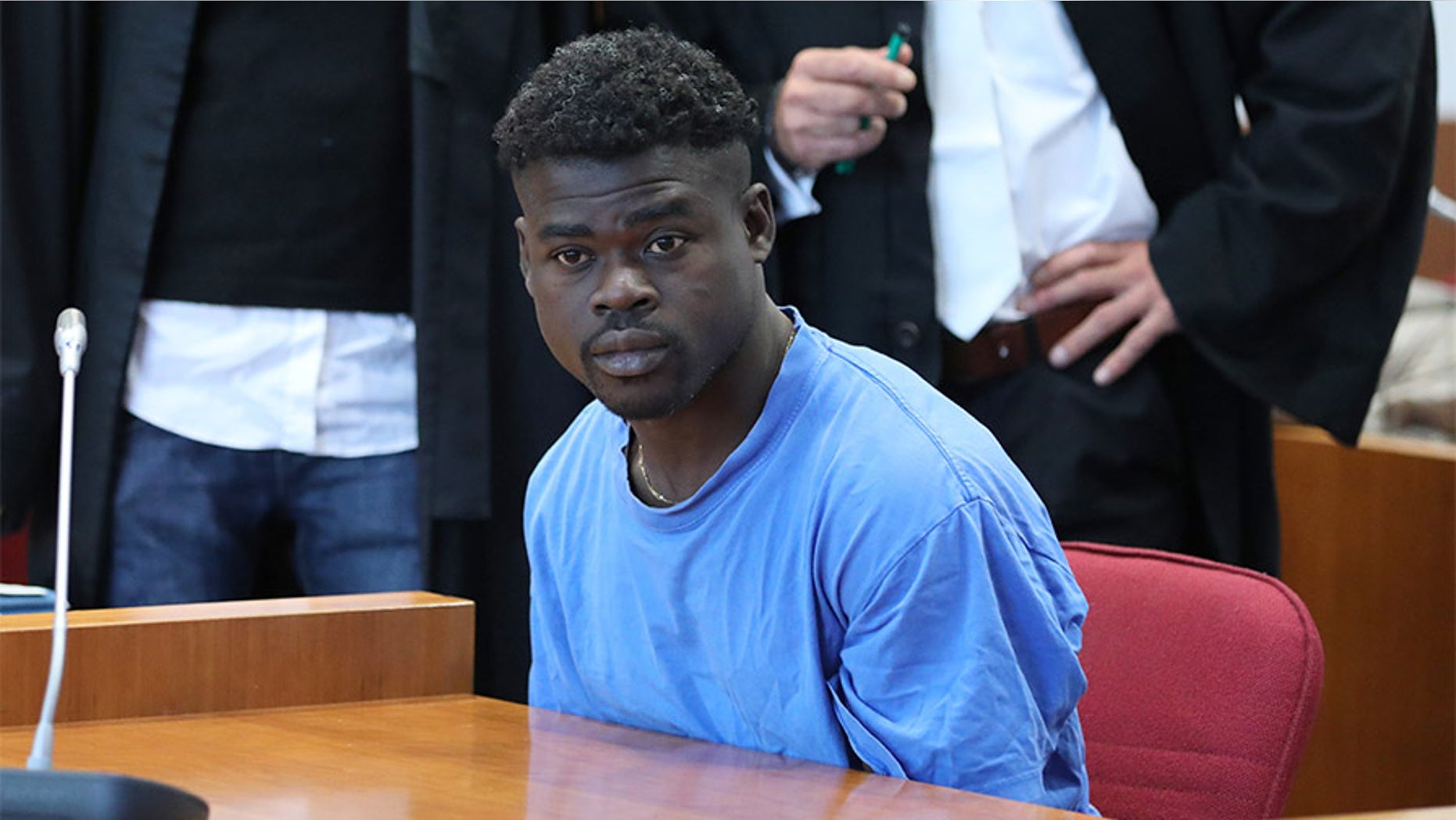Defendant Eric X. in the courtroom in Bonn, Germany.
