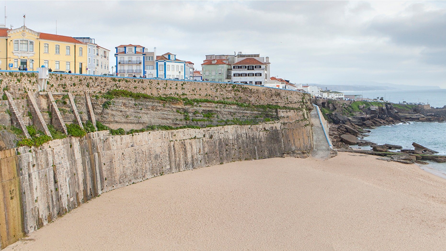 The British and Australian tourists died after they fell 100 feet off a wall at Portugal's Pescadores beach in Ericeira, a popular tourist and surfing spot