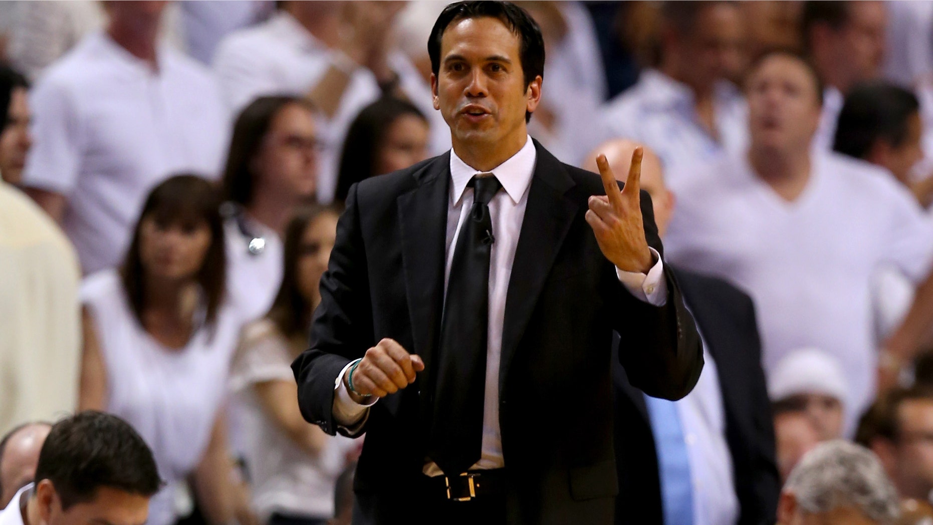 MIAMI, FL - JUNE 20: Head coach Erik Spoelstra of the Miami Heat calls out in the third quarter while taking on the San Antonio Spurs during Game Seven of the 2013 NBA Finals at AmericanAirlines Arena on June 20, 2013 in Miami, Florida. NOTE TO USER: User expressly acknowledges and agrees that, by downloading and or using this photograph, User is consenting to the terms and conditions of the Getty Images License Agreement. (Photo by Mike Ehrmann/Getty Images)