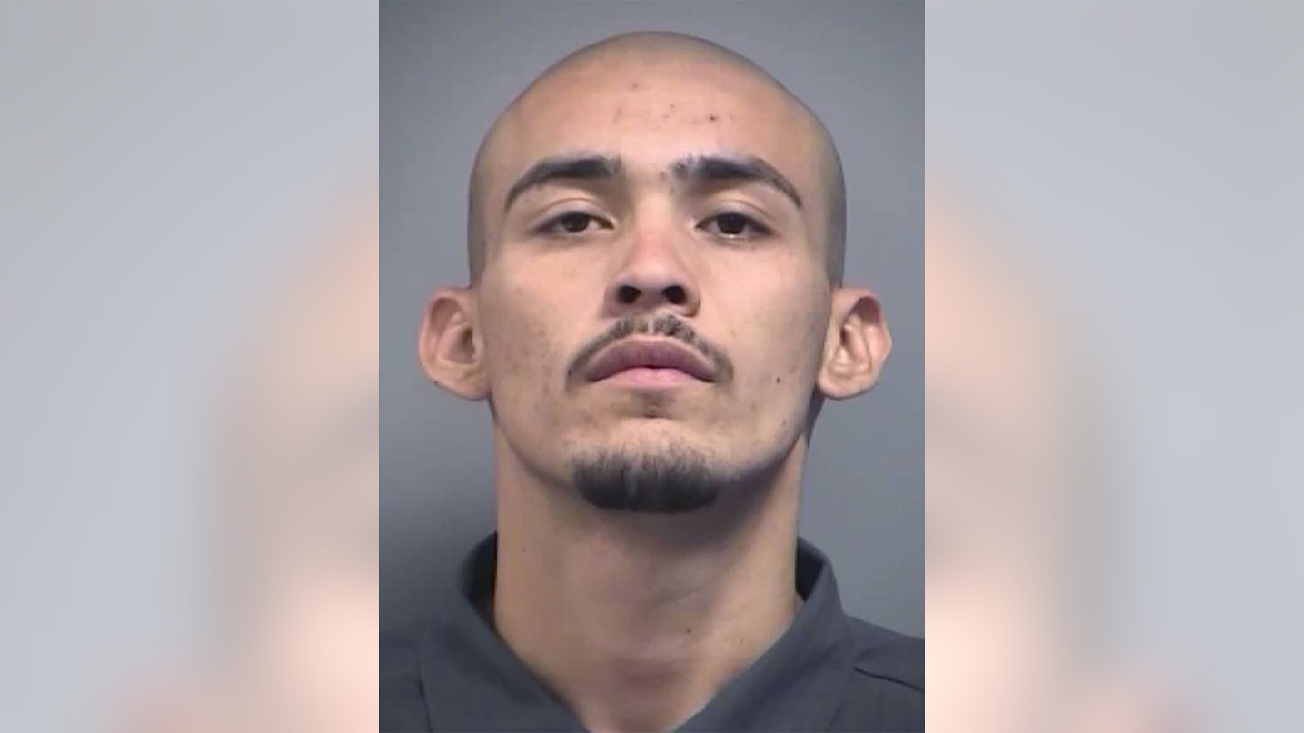 This undated jail booking photo provided by the North Las Vegas Police Department shows Alonso Perez, 25.