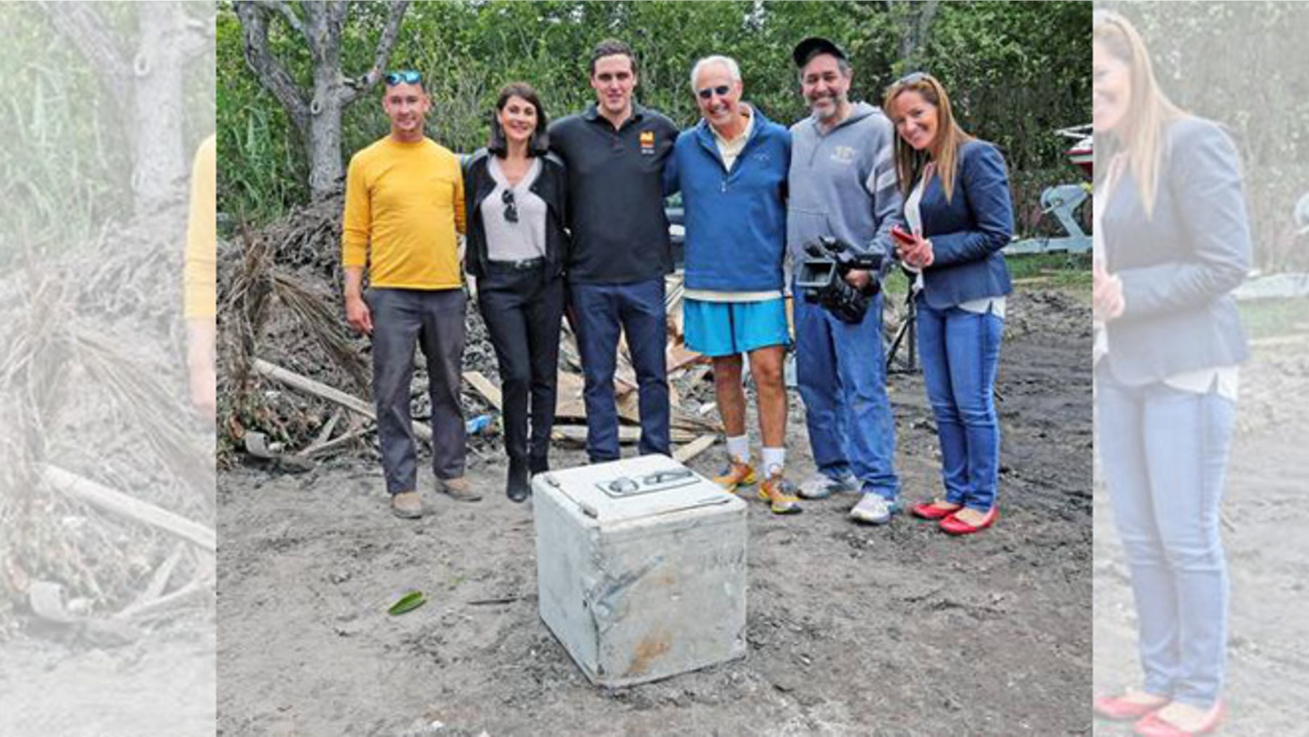 Pablo Escobar's safe at the feet of its new owner, Christian de Berdouare (center). (Photo: Used with permission of Christian de Berdouare)
