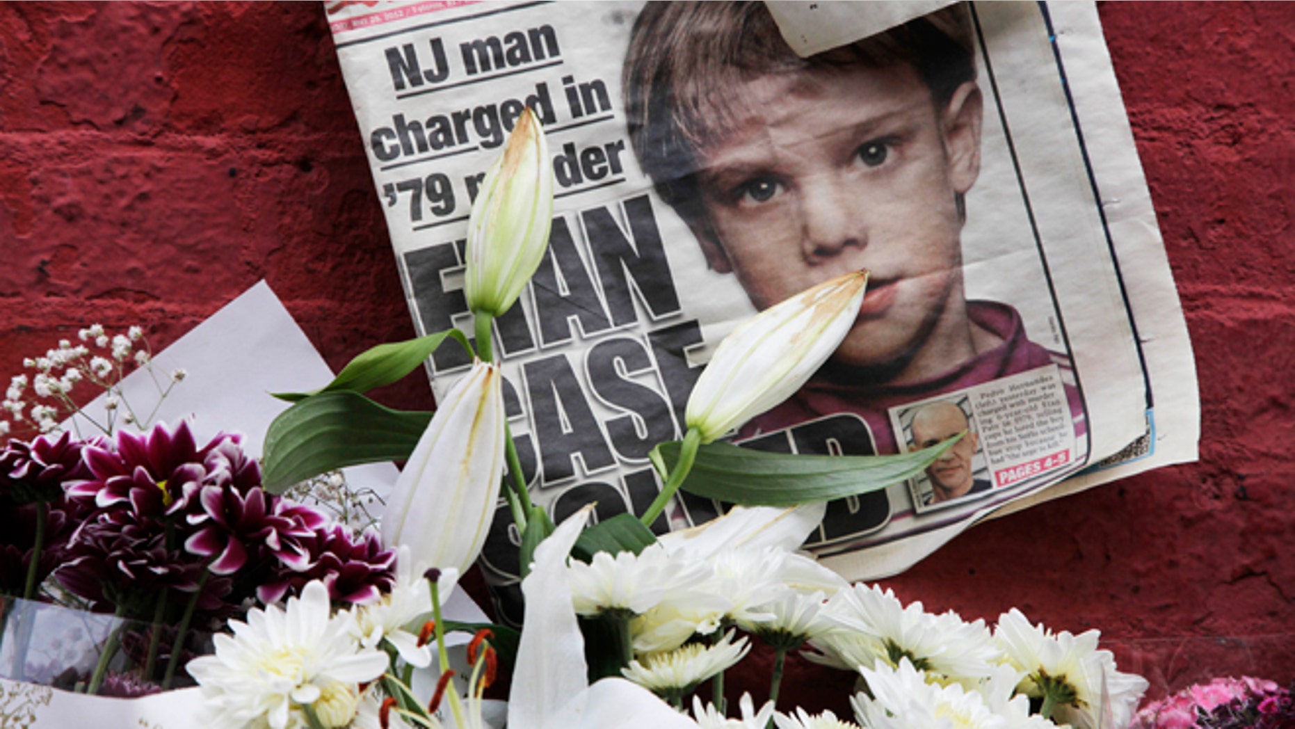 FILE - This May 28, 2012, file photo shows a newspaper with a photograph of Etan Patz that is part of a makeshift memorial in the SoHo neighborhood of New York. Jury selection is set to start Monday, Jan. 5, 2015, in Hernandezâs murder trial. As the murder case surrounding Patz' notorious 1979 disappearance heads to trial, missing-childrenâs advocates see it as proof that such cases still can be pursued after decades. (AP Photo/Mark Lennihan, File)