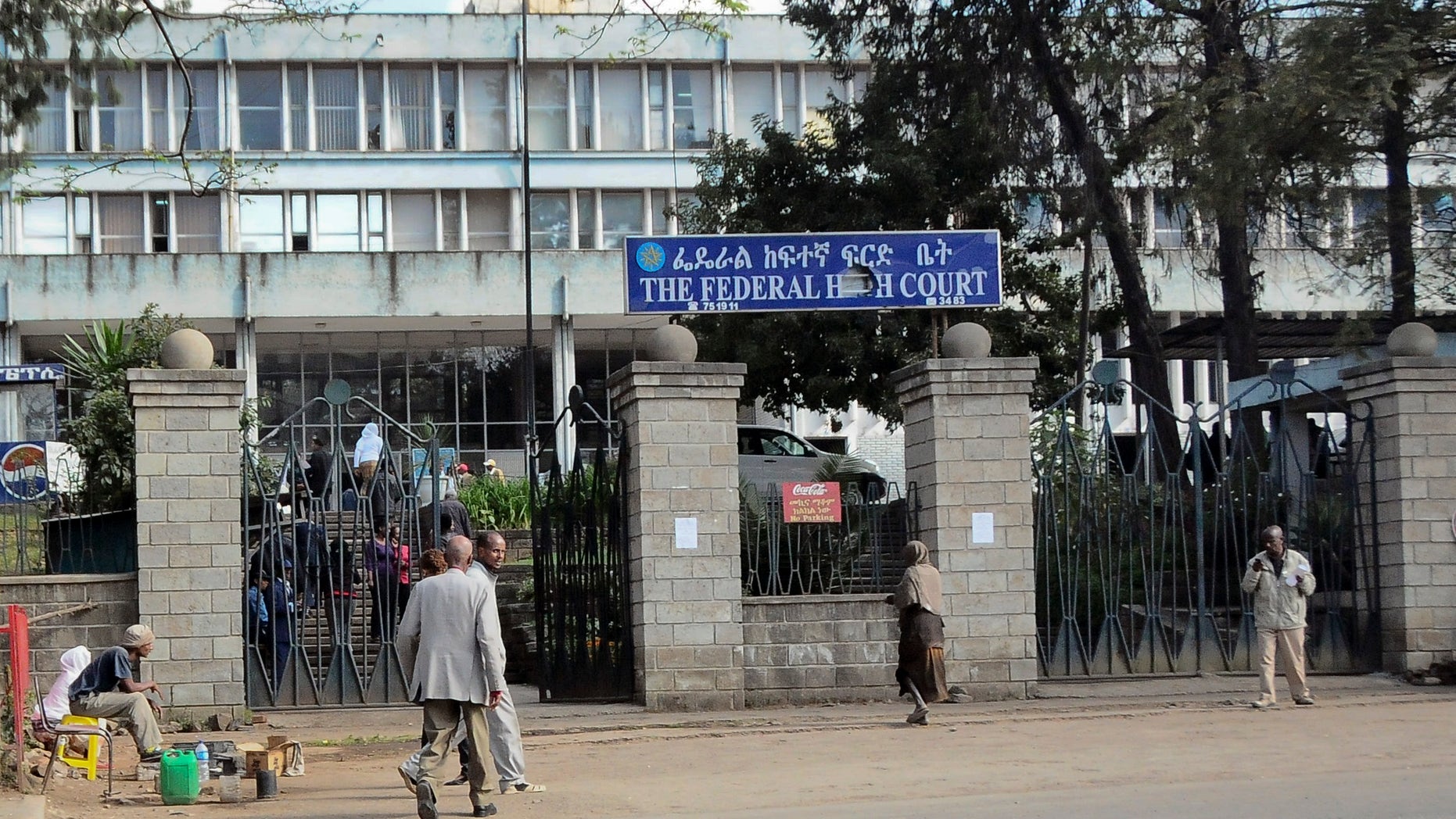 Nov. 1, 2011: Pedestrians walk past the Federal High Court building in Addis Ababa, Ethiopia.