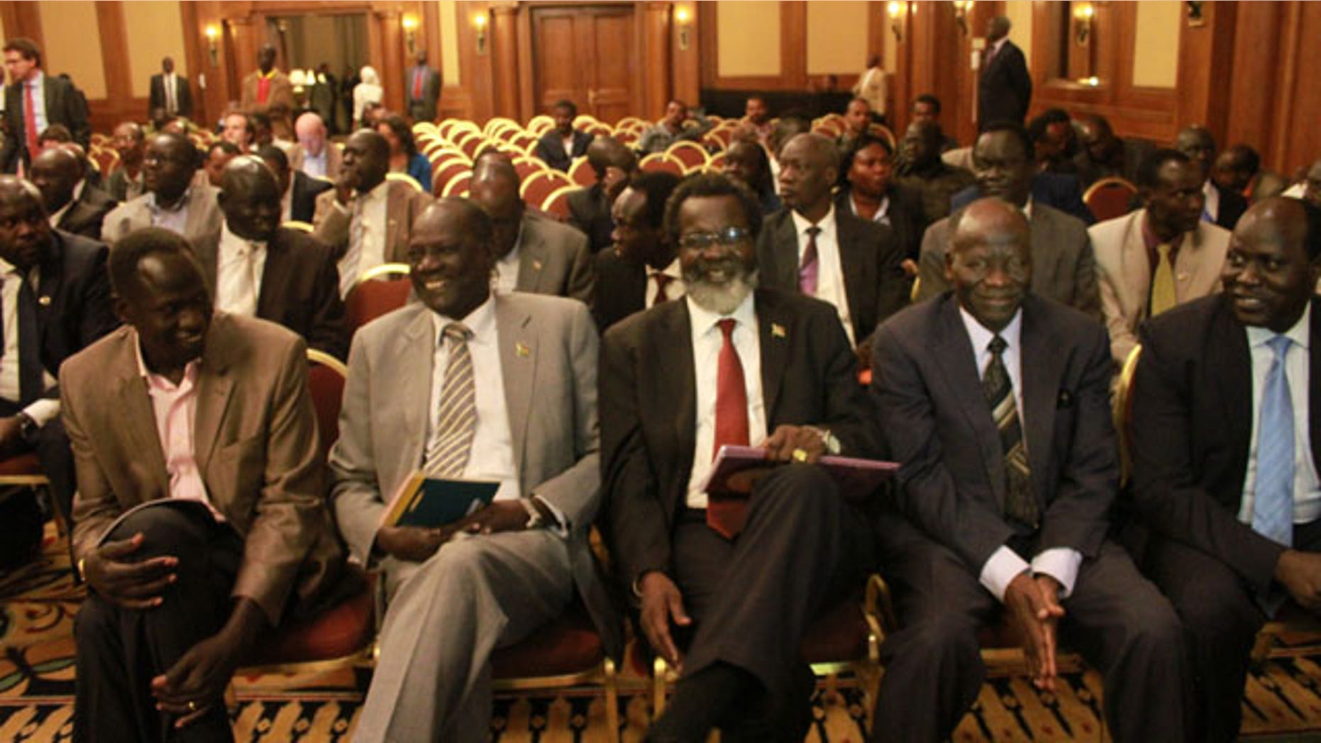 January 4, 2014: Unidentified delegates of the South Sudan Government sit in the front row at a press conference at the Sheraton Hotel in Addis Ababa, Ethiopia. (AP)