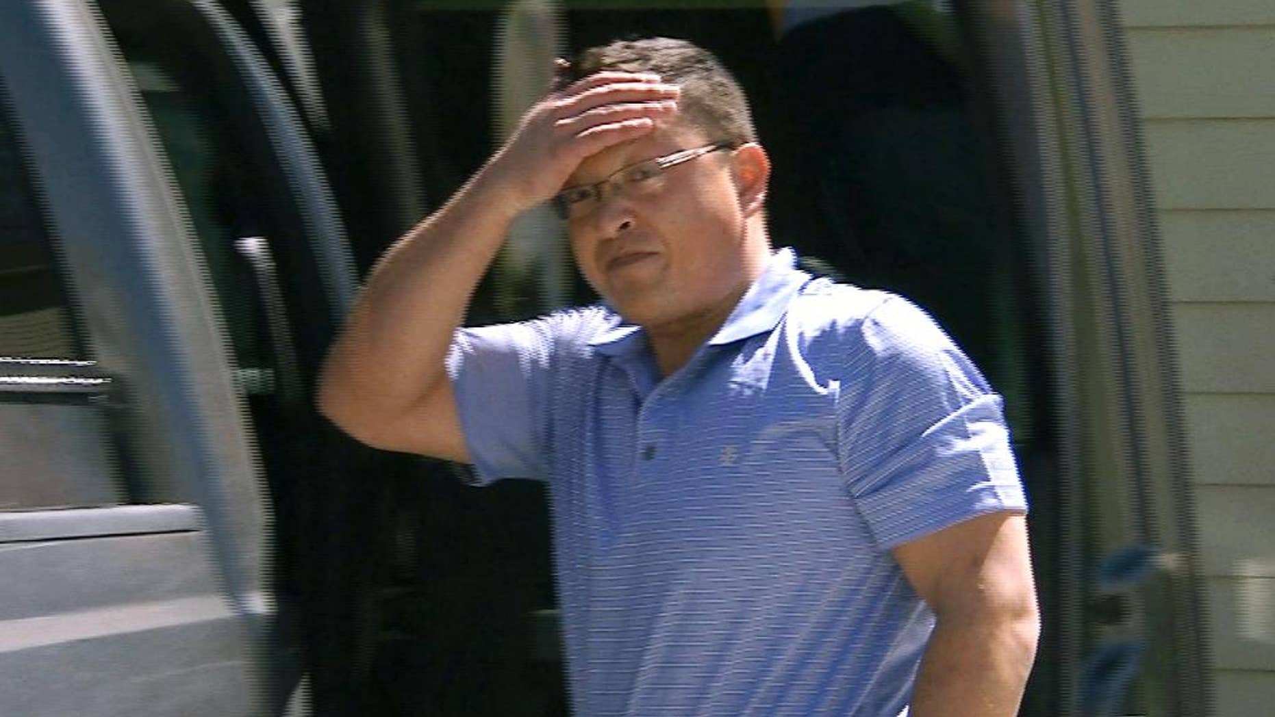 This undated still image taken from video shows Markus Kaarma at his home in Missoula, Mont. Kaarma has been charged with deliberate homicide in the shooting death of 17-year-old Diren Dede, an exchange student from Germany. Prosecutors said Kaarma fired his shotgun into his garage after sensors alerted him to an intruder Tuesday, April 27, 2014. (AP Photo/Bill Gorman)