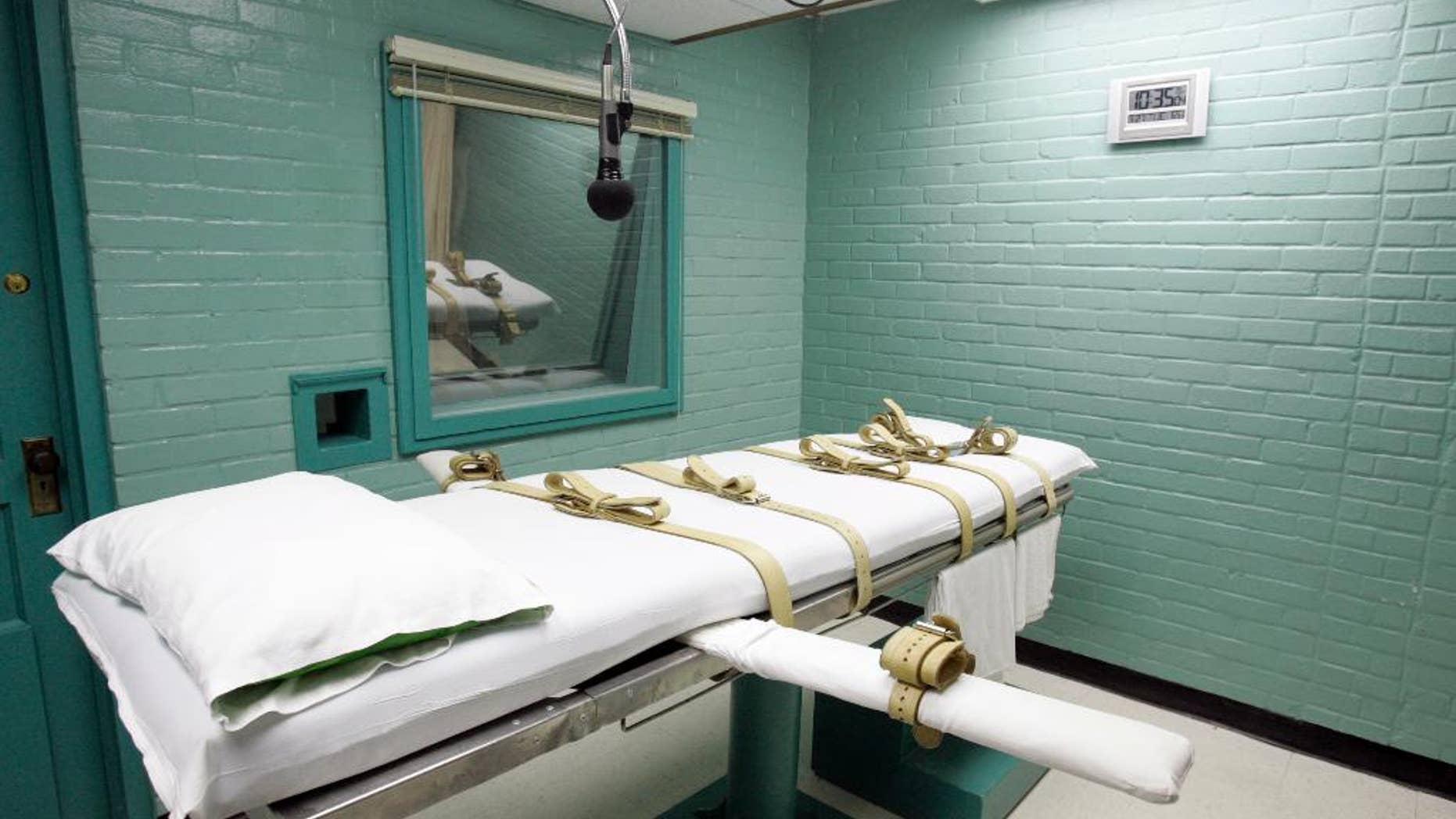 FILE - The gurney in the death chamber is shown in this May 27, 2008 file photo from Huntsville, Texas. Anti-death penalty advocates believe, Texas and other states are trumping up the possibility of violence to avoid having to disclose their name of suppliers, ensuring they can keep buying the drugs they need to put condemned inmates to death. (AP Photo/Pat Sullivan, File)