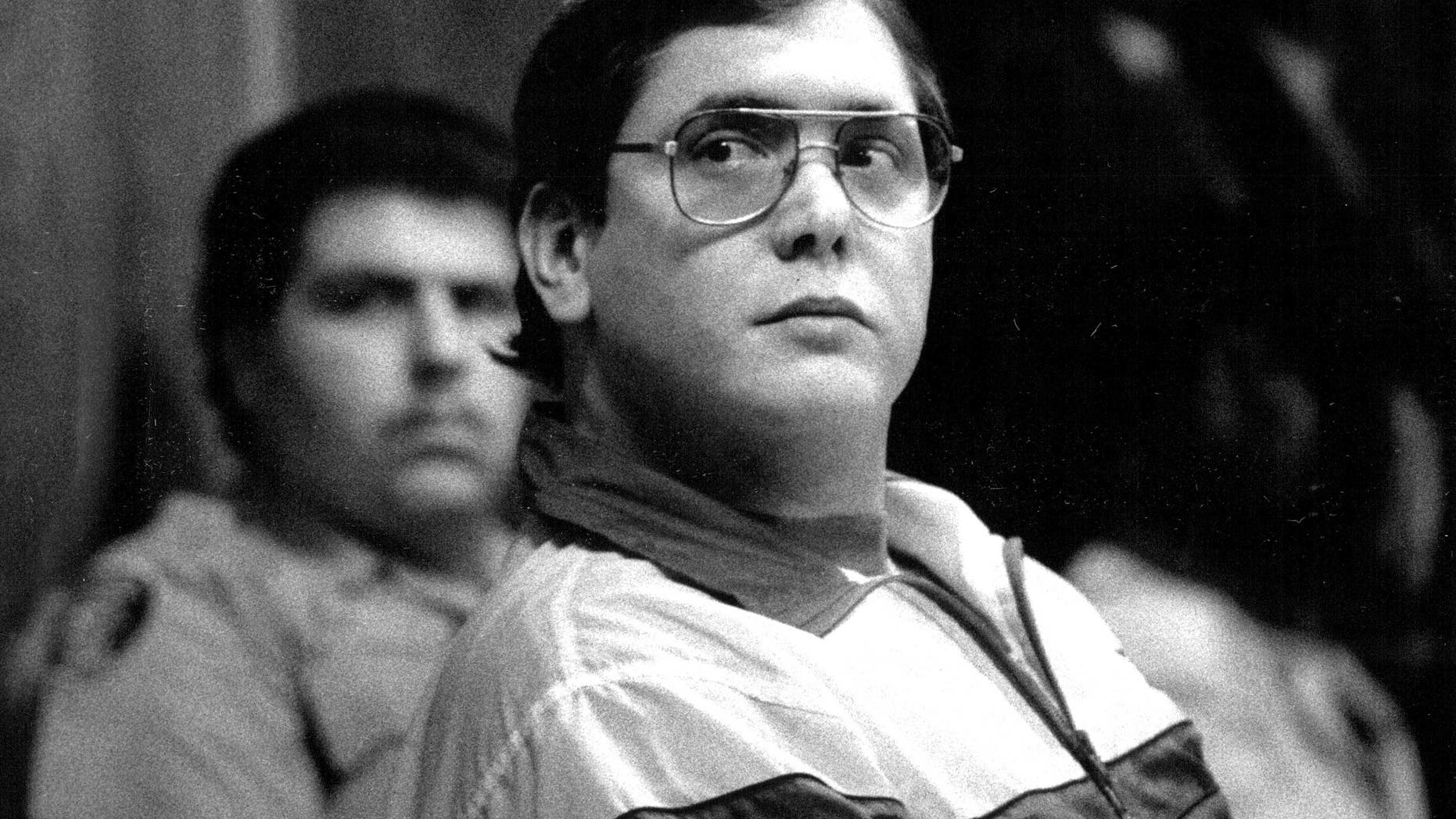 In a 1988 photo, Manuel Pardo listens as his sentence is read; he was found guilty of nine counts of murder.