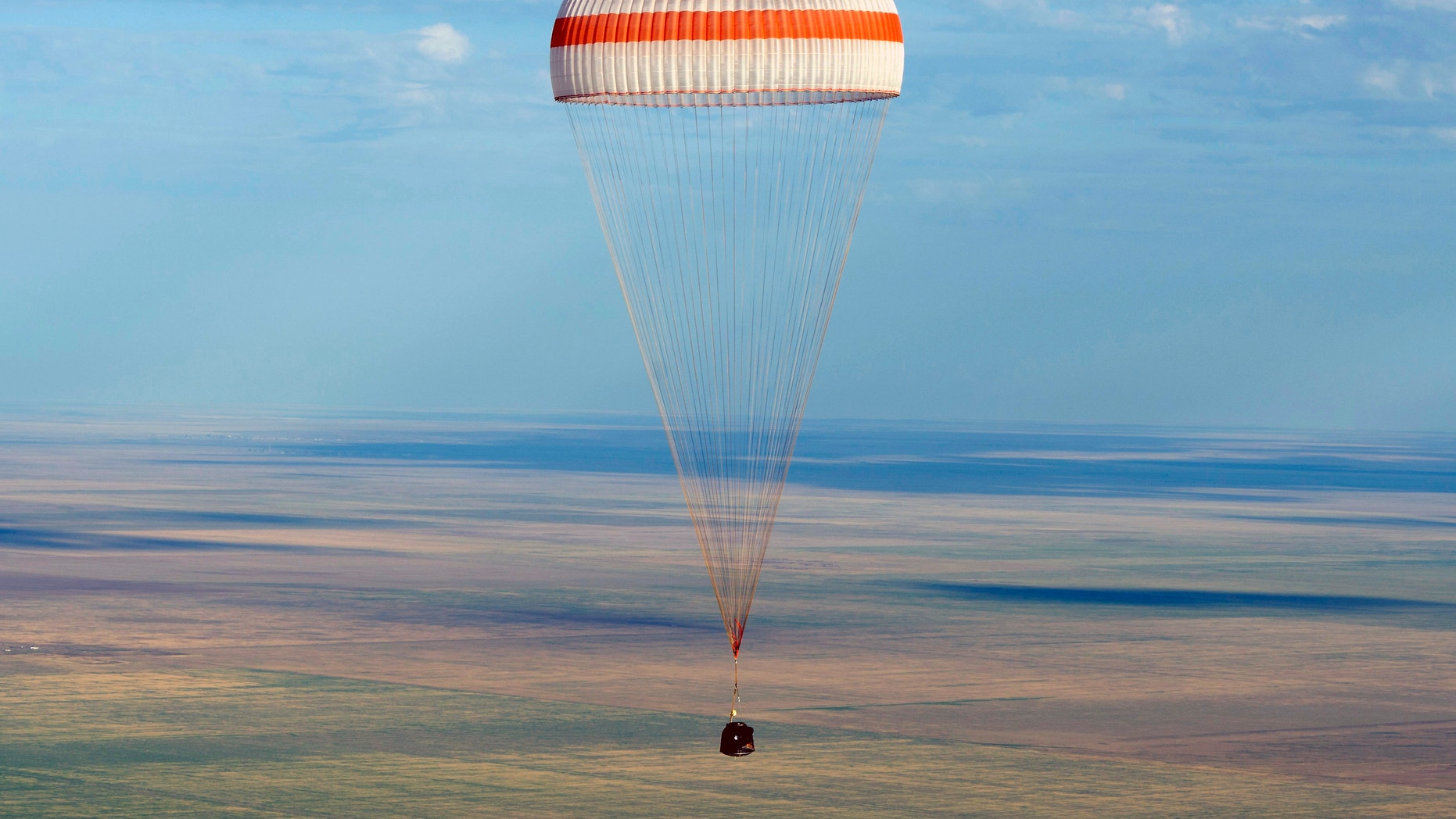 Sept. 17, 2012: The Soyuz TMA-04M spacecraft lands with Expedition 32 Commander Gennady Padalka of Russia, NASA Flight Engineer Joe Acaba and Russian Flight Engineer Sergie Revin in a remote area near the town of Arkalyk, Kazakhstan.