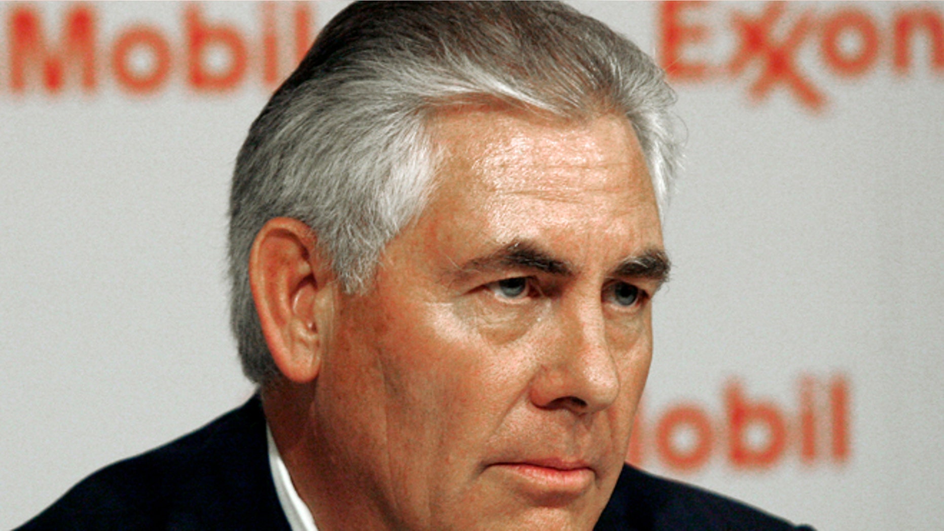 In this file photo from May. 27, 2009, Exxon Mobil Chairman and CEO Rex W. Tillerson speaks at a news conference following the annual shareholders meeting in Dallas.