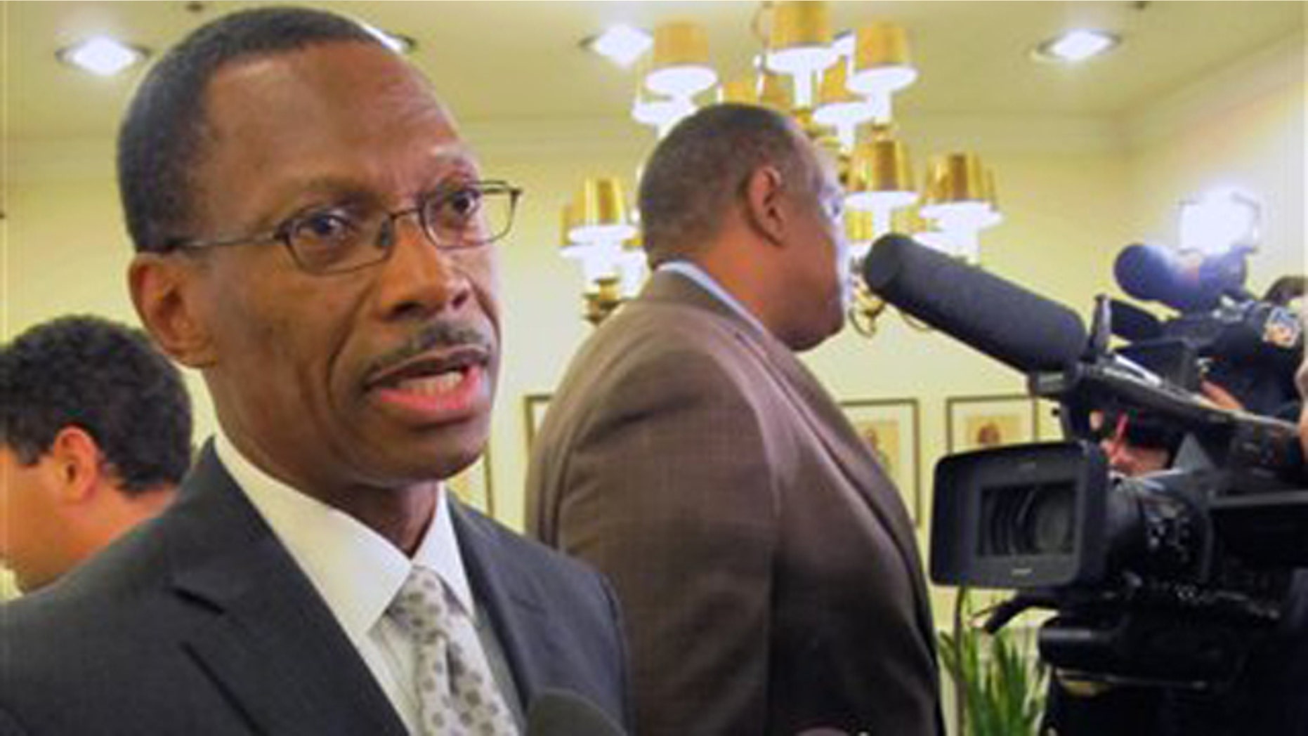 Dec. 16: Florida A&M University President James Ammons talks with reporters in the lobby of the governor’s office at the state Capitol in Tallahassee, Fla., following a 45-minute meeting with Gov. Rick Scott.