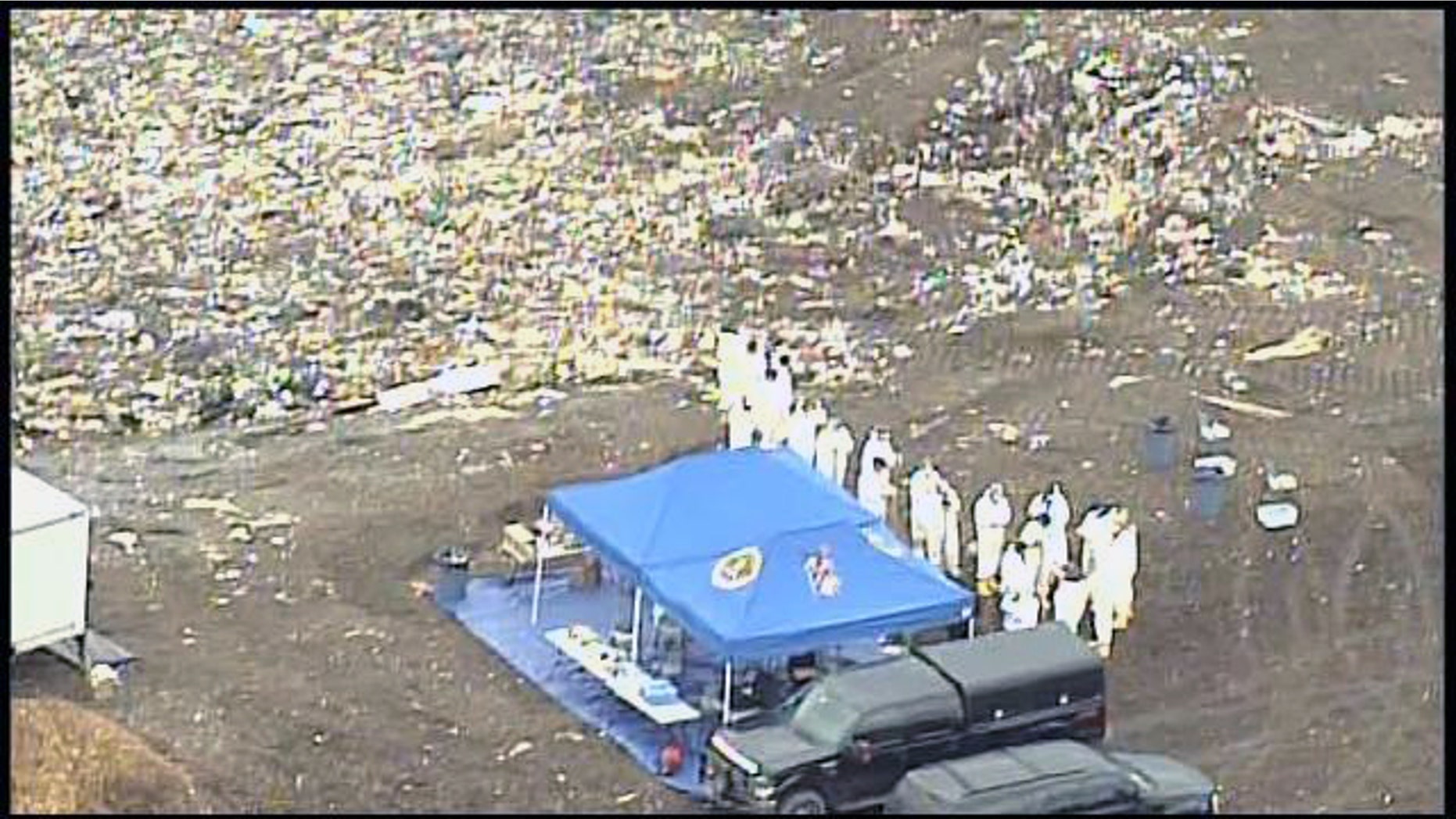 In this aerial photo FBI investigators are seen searching a landfill near the UMass-Dartmouth campus where Boston Marathon bombing suspect Dzhokhar Tsarnaev was a student.