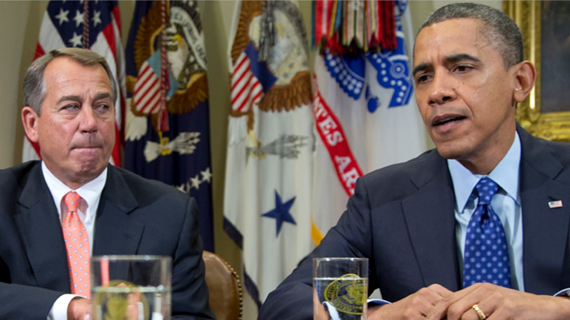 FILE - This Nov. 16, 2012 file photo, President Barack Obama, accompanied by House Speaker John Boehner of Ohio, speaks to reporters in the Roosevelt Room of the White House in Washington. President Barack Obamaâs re-election has stiffened Democratsâ spine against cutting popular benefit programs like Medicare and Social Security. Their new resolve could become as big a hurdle to reaching a deal for skirting economy-crippling tax increases and spending cuts in January as Republicansâ resistance raising tax rates on the wealthy. (AP Photo/Carolyn Kaster, File)