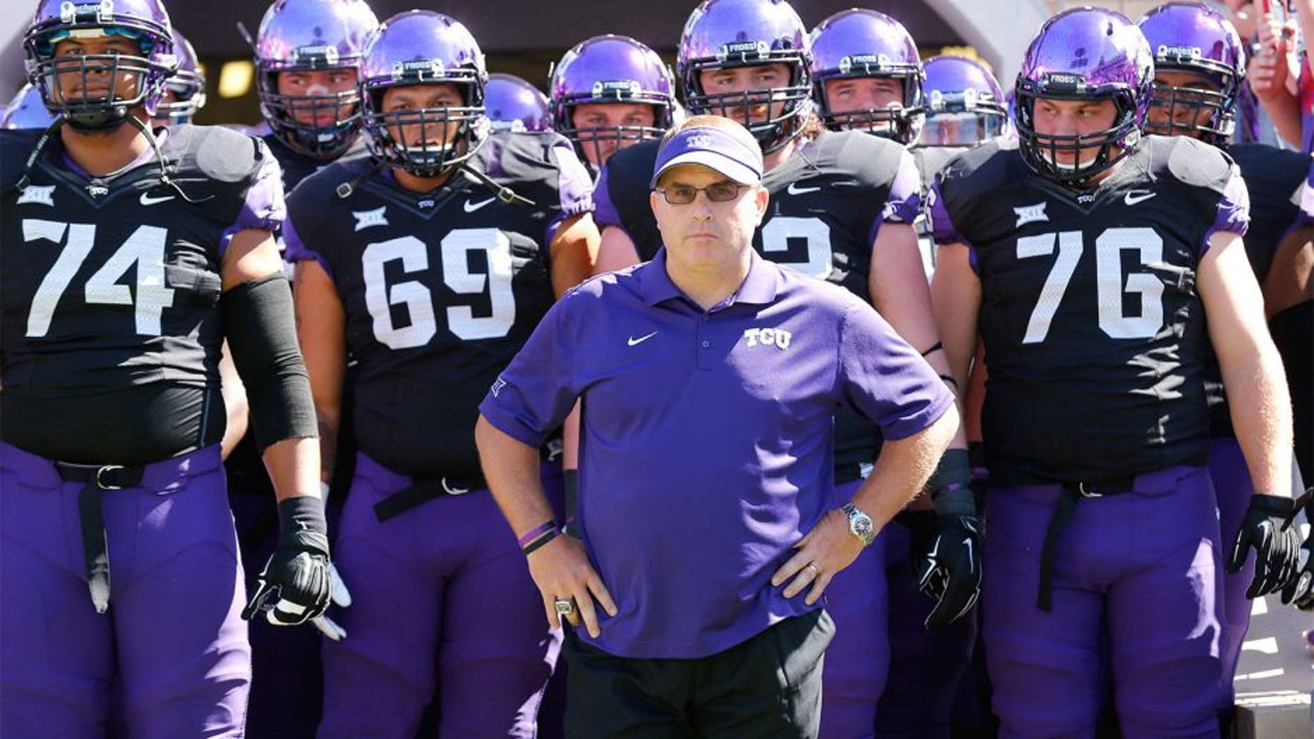 Oct 4, 2014; Fort Worth, TX, USA; TCU Horned Frogs head coach Gary Patterson waits to take the field with his team against the Oklahoma Sooners at Amon G. Carter Stadium. The Horned frogs beat the Sooners 37-33. Mandatory Credit: Matthew Emmons-USA TODAY Sports