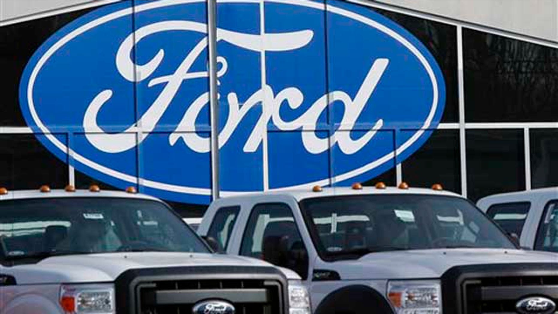 In this March 29, 2011 photo, new 2011 Ford F-150 trucks are shown at a dealership in Glbert, Ariz. Consumer demand for Ford's fuel-efficient vehicles continues to grow as March sales increased 19 percent versus a year ago.