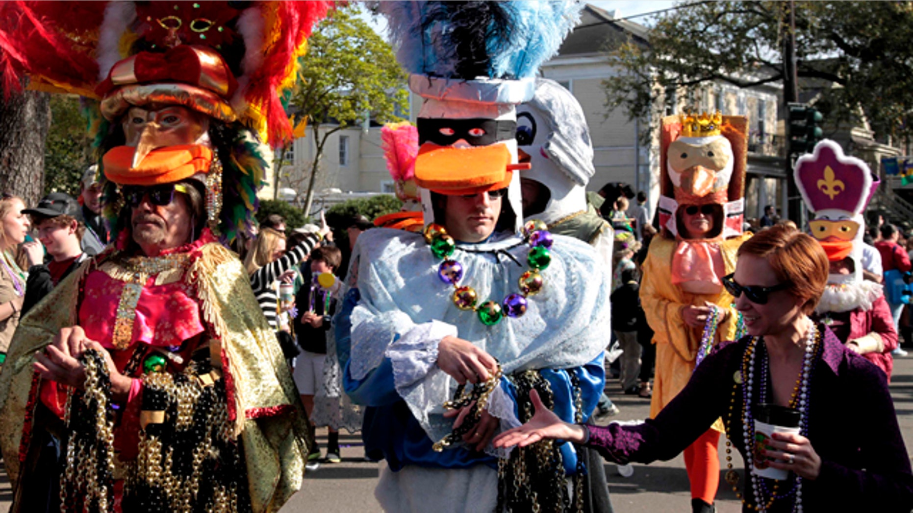 Monday, Feb. 20, 2012: The Mardi Gras "Krewe of Tucks" parade drives through the streets of New Orleans. It may be just another Monday anywhere else, but in New Orleans it's Lundi Gras the day before the Carnival season culminates on Fat Tuesday.