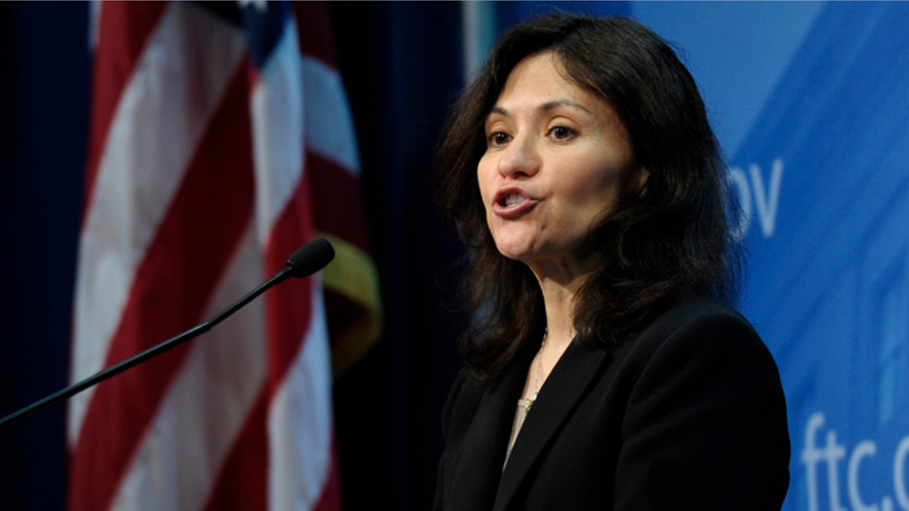 Jan. 15, 2014: Federal Trade Commission (FTC) Chair Edith Ramirez speaks at the FTC in Washington, where she announced Apple will refund $32.5 million to consumers to settle a federal case involving purchases that kids made without their parents' permission while playing on mobile apps.