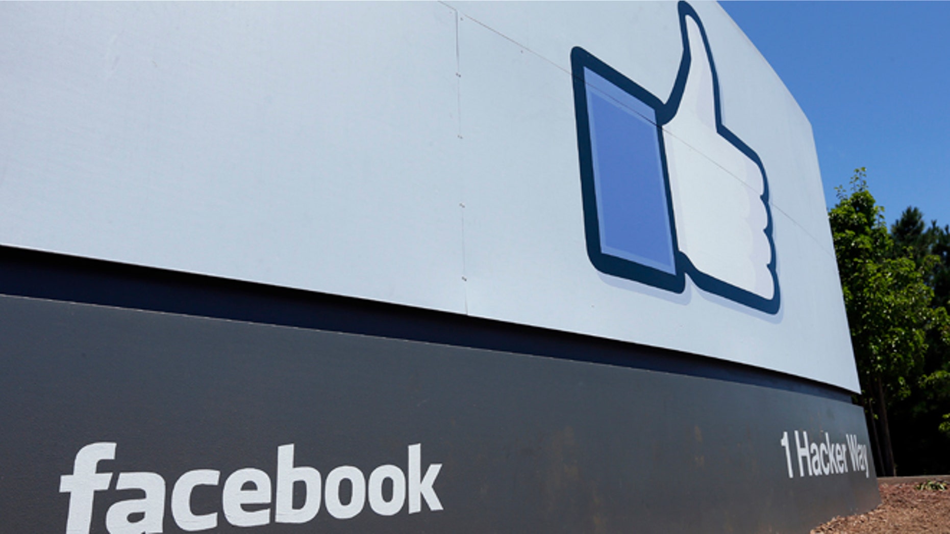 This July 16, 2013 FILE photo, shows a sign at Facebook headquarters in Menlo Park, Calif.