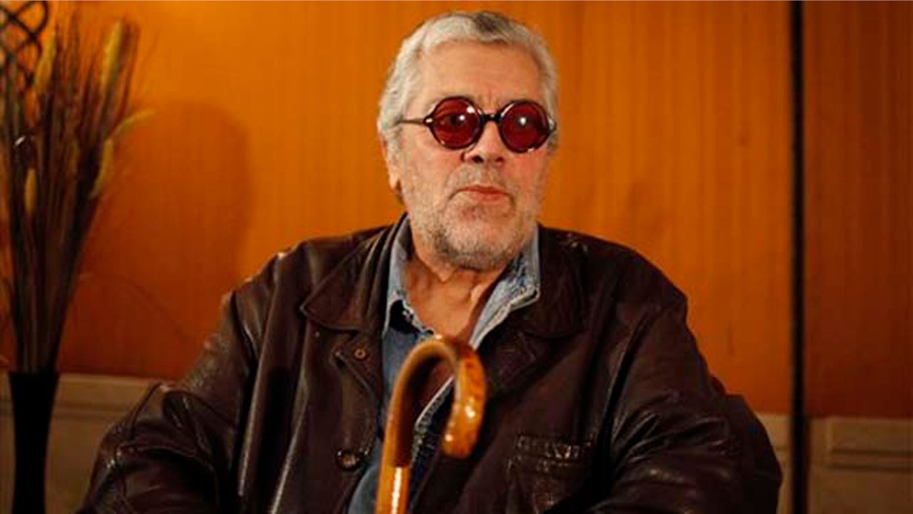In this Aug. 25, 2010 file photo Argentine folk singer Facundo Cabral attends a news conference in Mexico City. The singer was shot to death Saturday July 9, 2011, by unknown gunmen while on his his way to La Aurora International Airport in Guatemala City.