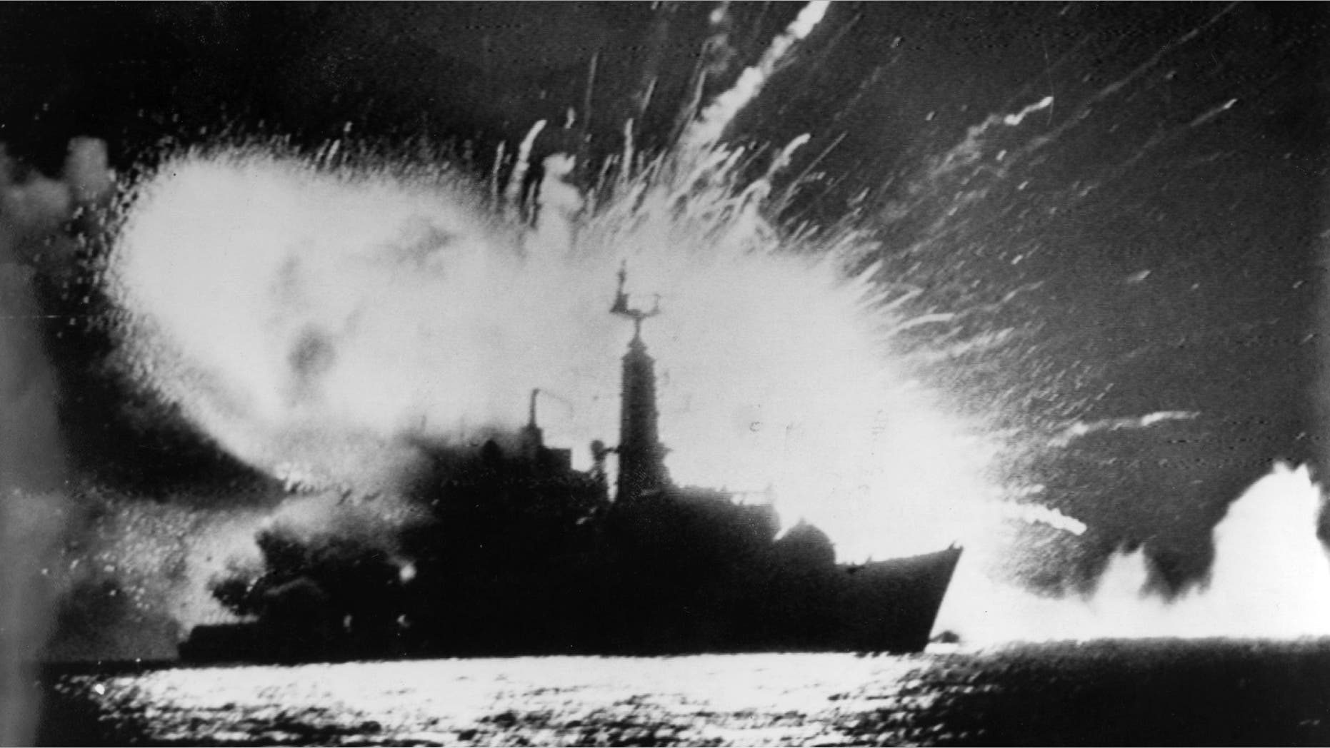 British Royal Navy frigate HMS Antelope explodes in the bay of San Carlos off East Falkland during the Falklands War. (Photo by Martin Cleaver/Pool/Getty Images)