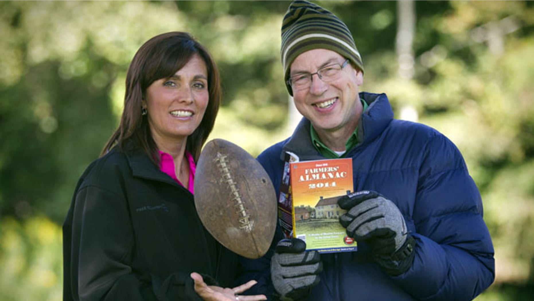 August 23, 2013: Farmers' Almanac managing editor Sandy Duncan, left, and editor Peter Geiger, pose in Lewiston, Maine. The 197-year-old almanac is predicting a colder-than-normal winter for most of the United States, with a winter storm hitting around the time of the Super Bowl on Feb. 2, 2014, in New Jersey. (AP Photo)