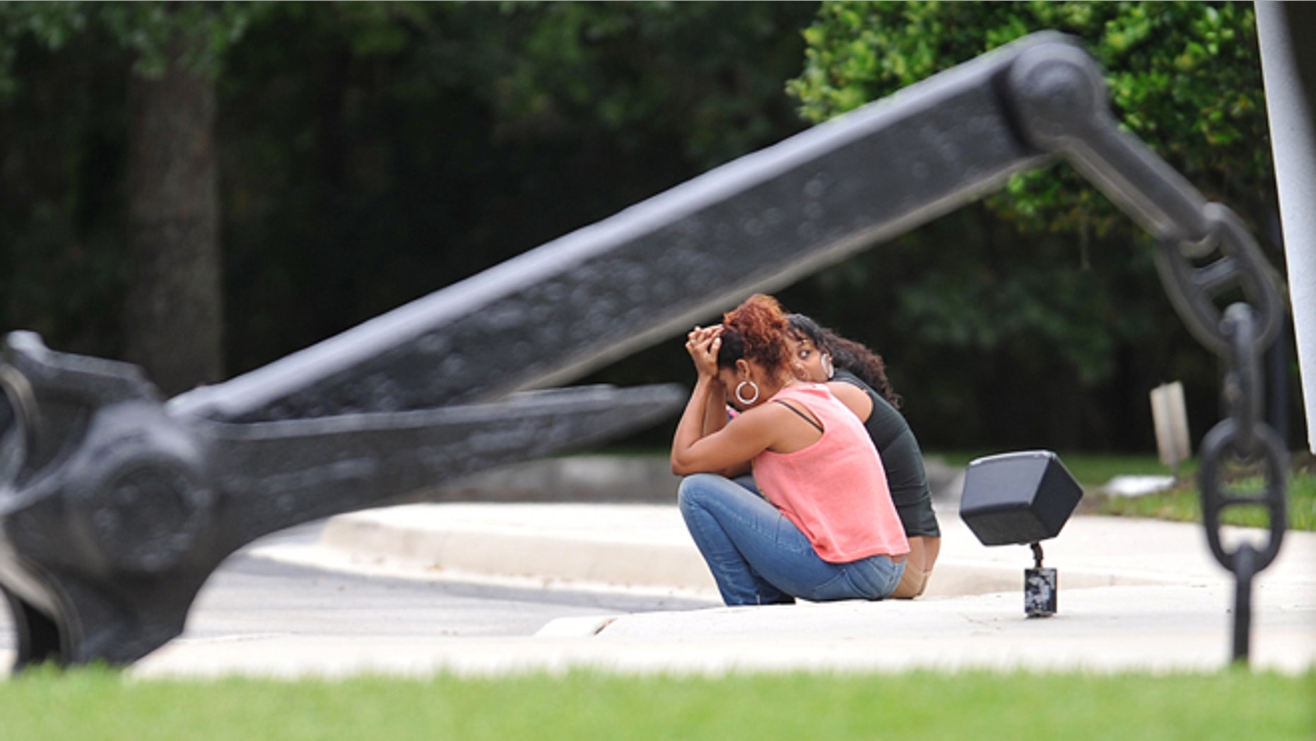 Families have gathered at the Seafarers Union Hall Sunday, Oct. 4, 2015, in Jacksonville, Fla., waiting for news on the crew of 33 aboard the missing cargo ship El Faro. (Bruce Lipsky/Florida Times-Union via AP)