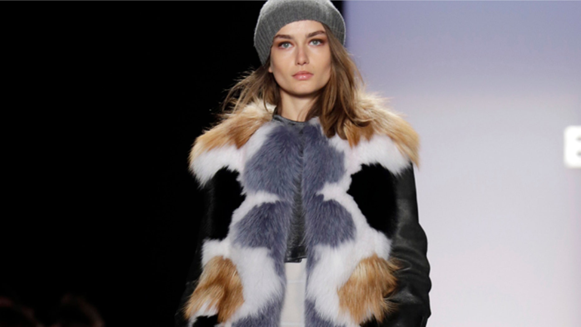 The BCBG Max Azria Fall 2013 collection is modeled during Fashion Week in New York on Thursday, Feb. 7, 2013.