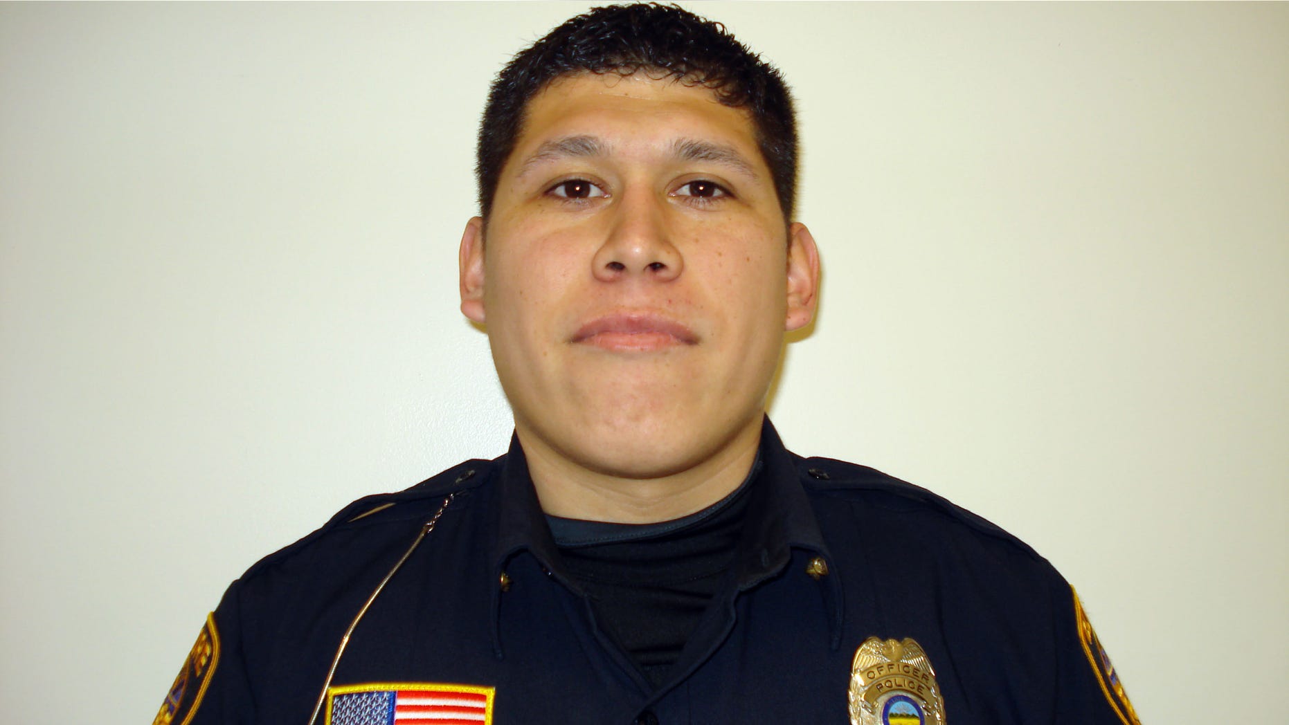 In this undated photo provided by Elmore police, officer Jose Andy Chavez is shown. Chavez was one of the three men killed in a shooting at the Last Call Bar in Fremont, Ohio, Sunday, March 9, 2014. No arrest has been made, and detectives are working to identify the gunman.