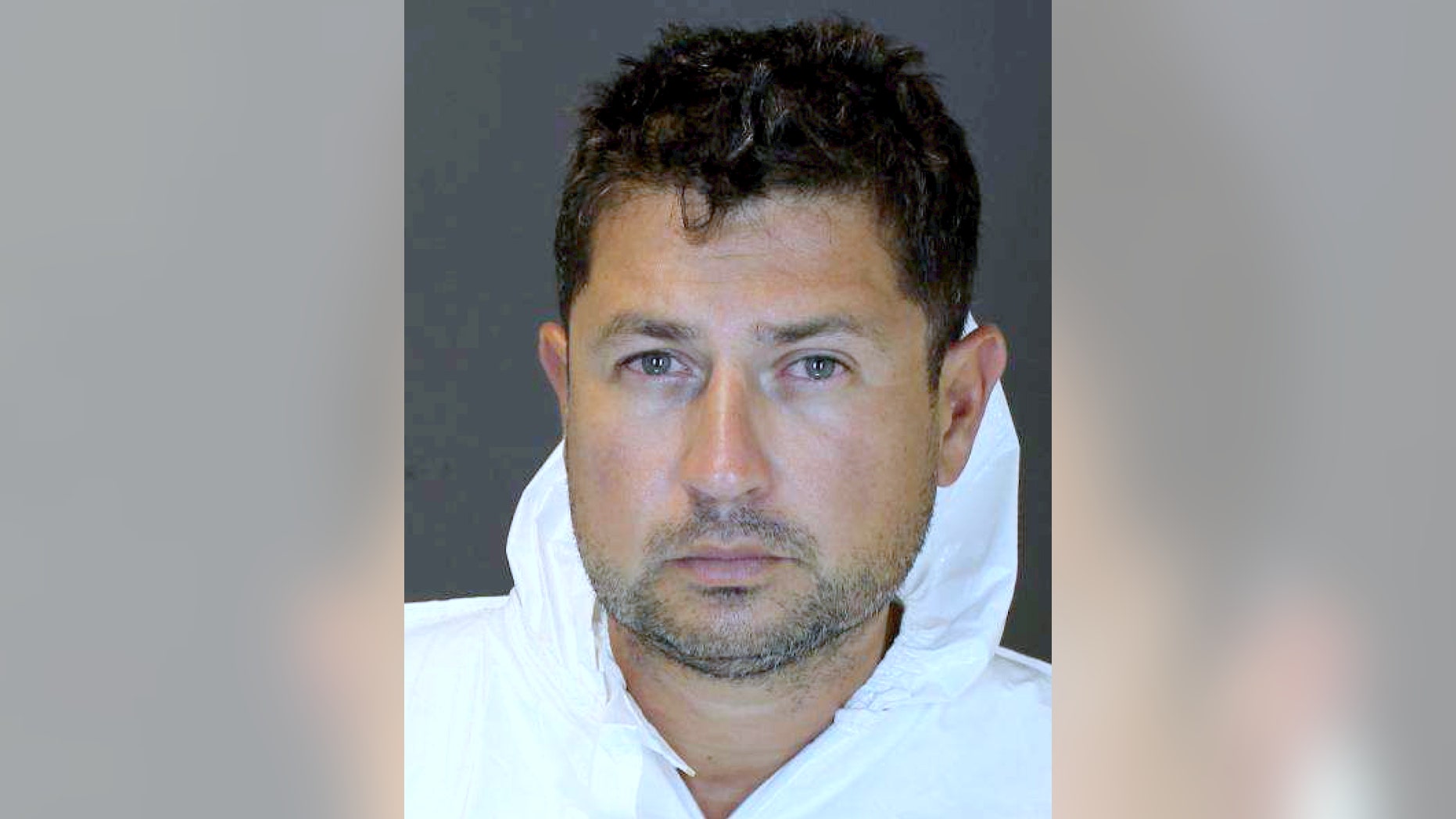 In this undated photo provided by the Suffolk County Police Department, real estate executive Sean Ludwick is shown. A spokesman for the Suffolk County district attorney says that Lidwick, who is facing vehicular homicide and drunken driving charges over a fatal crash in the Hamptons, was apprehended by federal authorities in Puerto Rico after trying to flee to South America. (Suffolk County Police Department via AP)