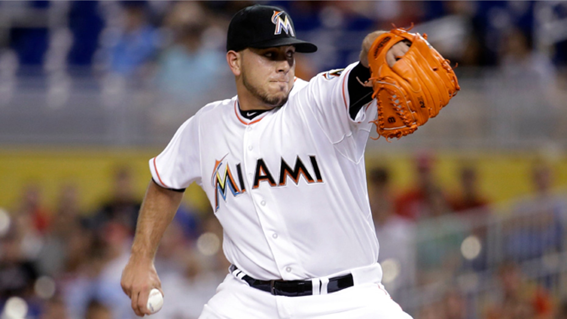 Miami Marlins starting pitcher Jose Fernandez winds up during the first inning of a baseball game against the Cincinnati Reds, Thursday, July 9, 2015,, in Miami. (AP Photo/Lynne Sladky)