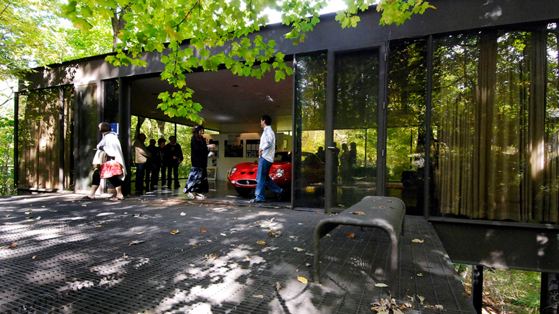 This Oct. 4, 2009 photo shows visitors touring the pavilion in the back of the modernist home in Highland Park, Ill., that was featured in the movie "Ferris Bueller's Day Off."