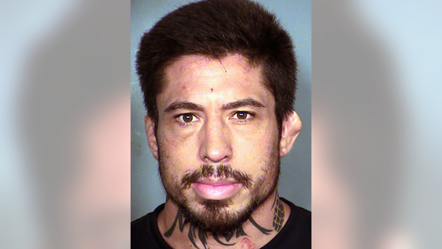 This Aug. 30, 2014 booking photo provided by the Las Vegas Metropolitan Police Department shows Jonathan Koppenhaver, also known as MMA fighter War Machine.