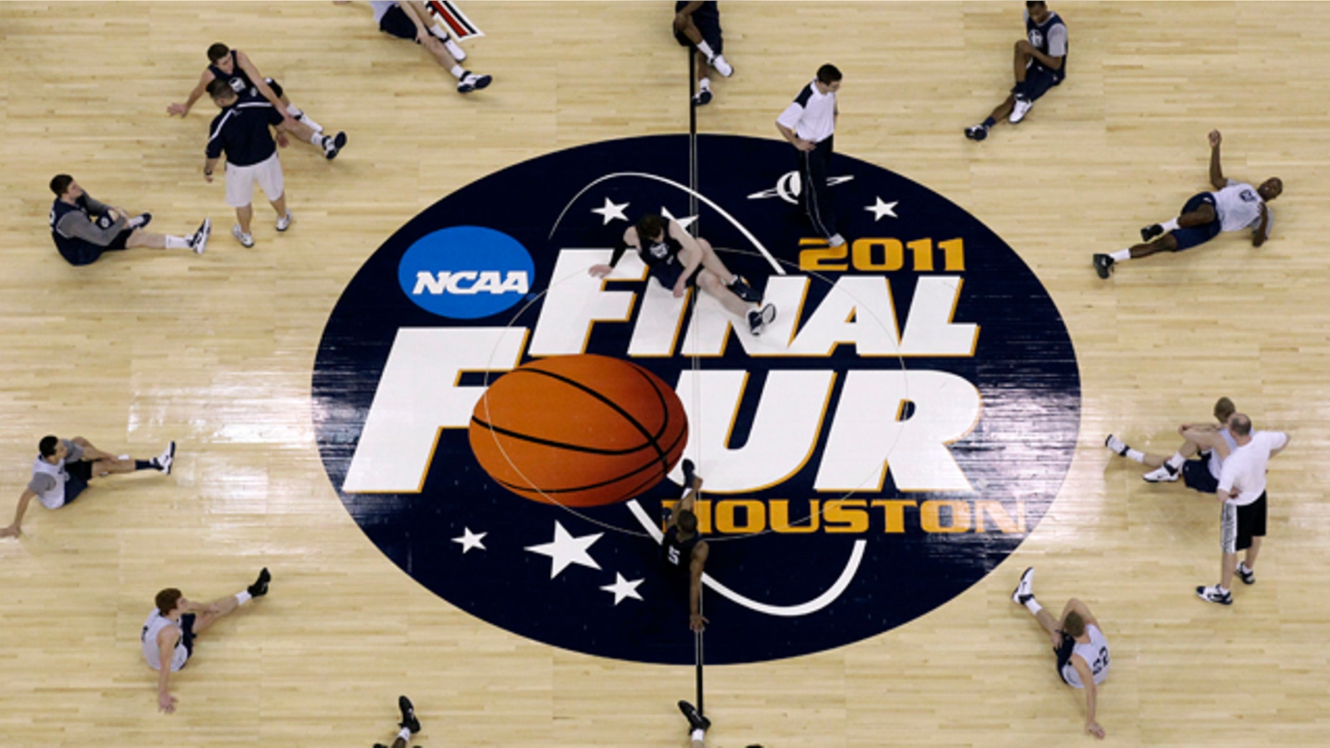Butler players stretch during a practice for a men's NCAA Final Four semifinal college basketball game Friday, March 1, 2011, in Houston. Butler plays VCU on Saturday. (AP Photo/David J. Phillip)