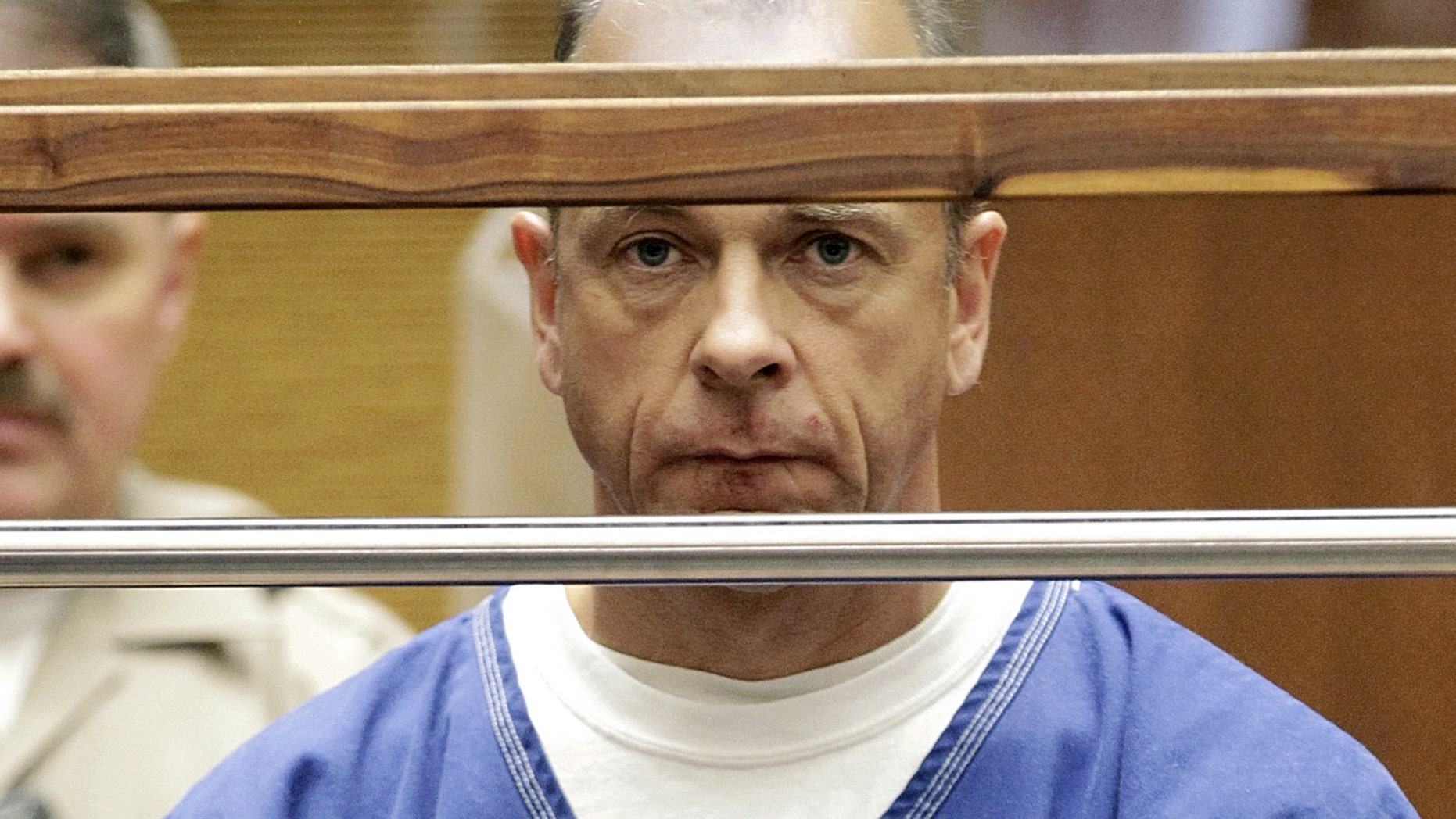 FILE - In this March 9, 2012 file photo, German architect Gerhard Becker appears at a preliminary hearing in Los Angeles. Becker pleaded no contest to involuntary manslaughter Friday, Jan. 3, 2014 in the death of a Los Angeles firefighter crushed in the collapse of a ceiling during a fire at a luxury home the architect designed and built in the Hollywood Hills. (AP Photo/Damian Dovarganes, File)