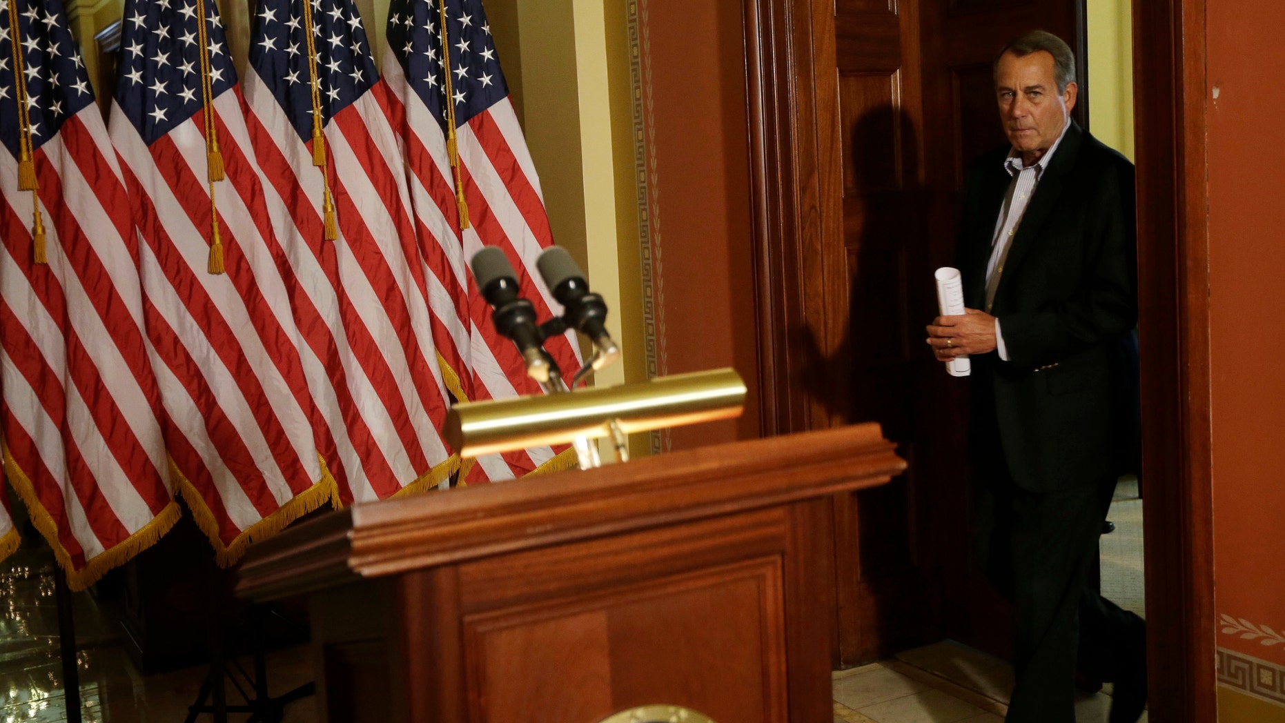 House Speaker John Boehner of Ohio arrives for a news conference on Capitol Hill in Washington, Friday, Dec. 7, 2012, to discuss the pending fiscal cliff. Boehner said there's been no progress in negotiations on how to avoid the fiscal cliff of tax hikes and spending cuts and called on President Barack Obama to come up with a new offer. (AP Photo/Pablo Martinez Monsivais)