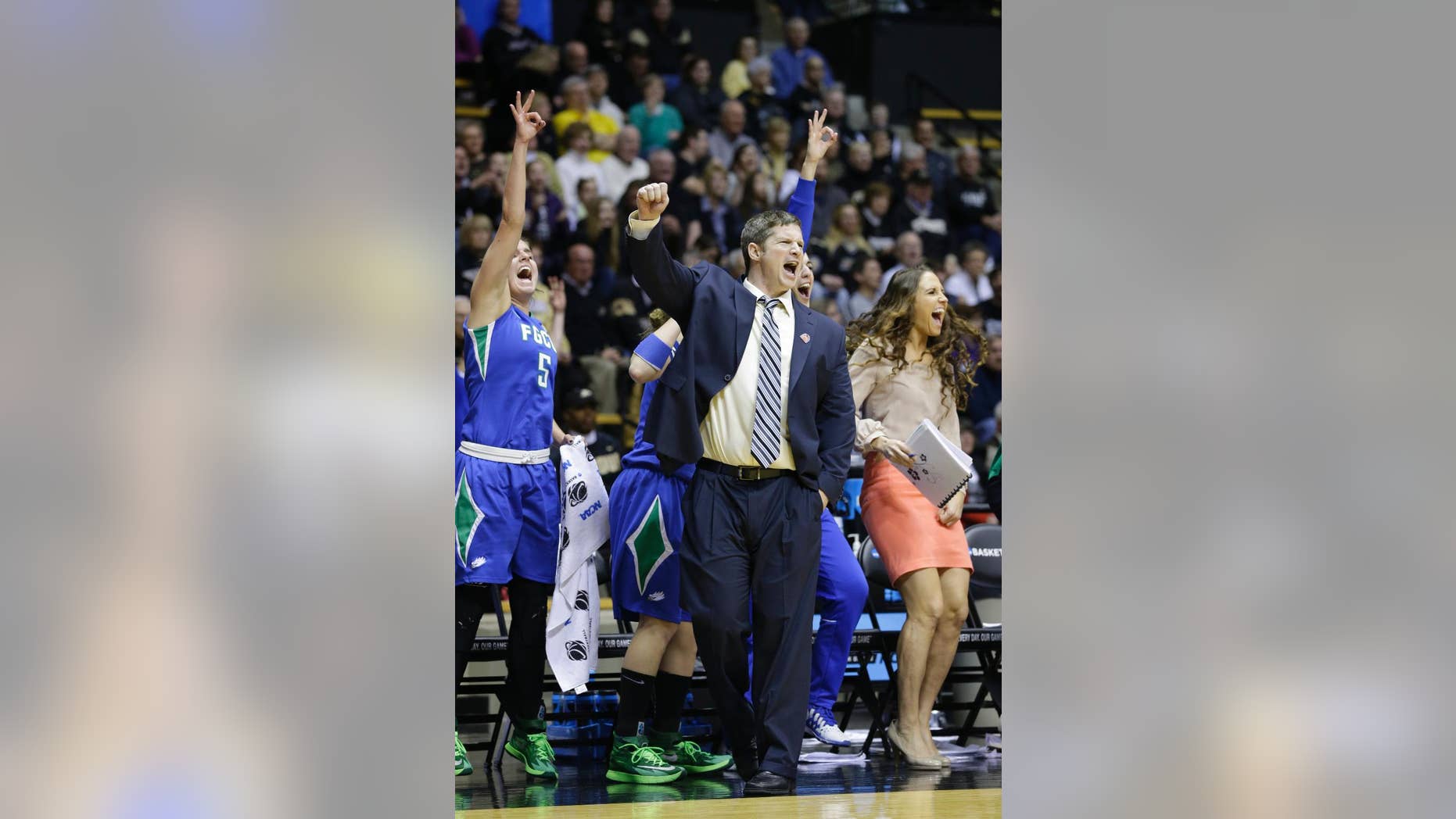 FILE - This March 22, 2014, file photo shows Florida Gulf Coast head coach Karl Smesko during the second half of a women's first round NCAA tournament college basketball game against Oklahoma State in West Lafayette, Ind. The Florida Gulf Coast coach with the tiny office has very quietly built a winning machine. (AP Photo/Michael Conroy, File)