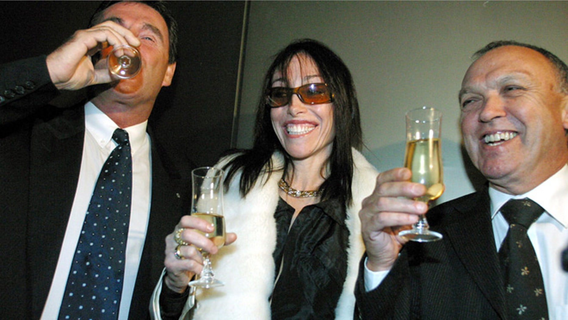 FILE 2003: Hollywood Madam Heidi Fleiss poses at the Australian Stock Exchange in Melbourne.
