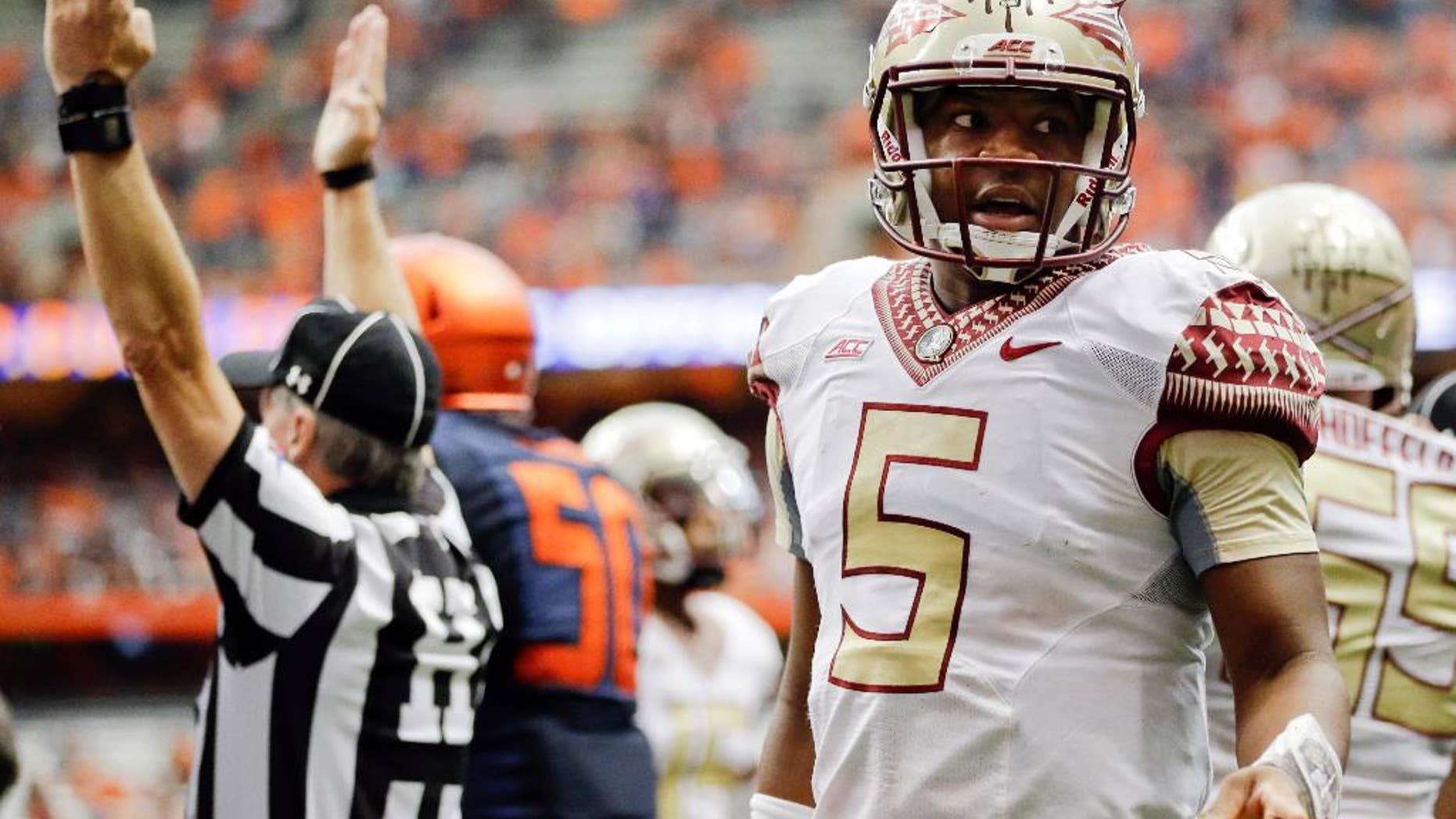 Syracuse head coach Scott Shafer yells to officials during the first half of an NCAA college football game against Florida State on Saturday, Oct. 11, 2014, in Syracuse, N.Y. Florida State won 38-20. (AP Photo/Mike Groll)