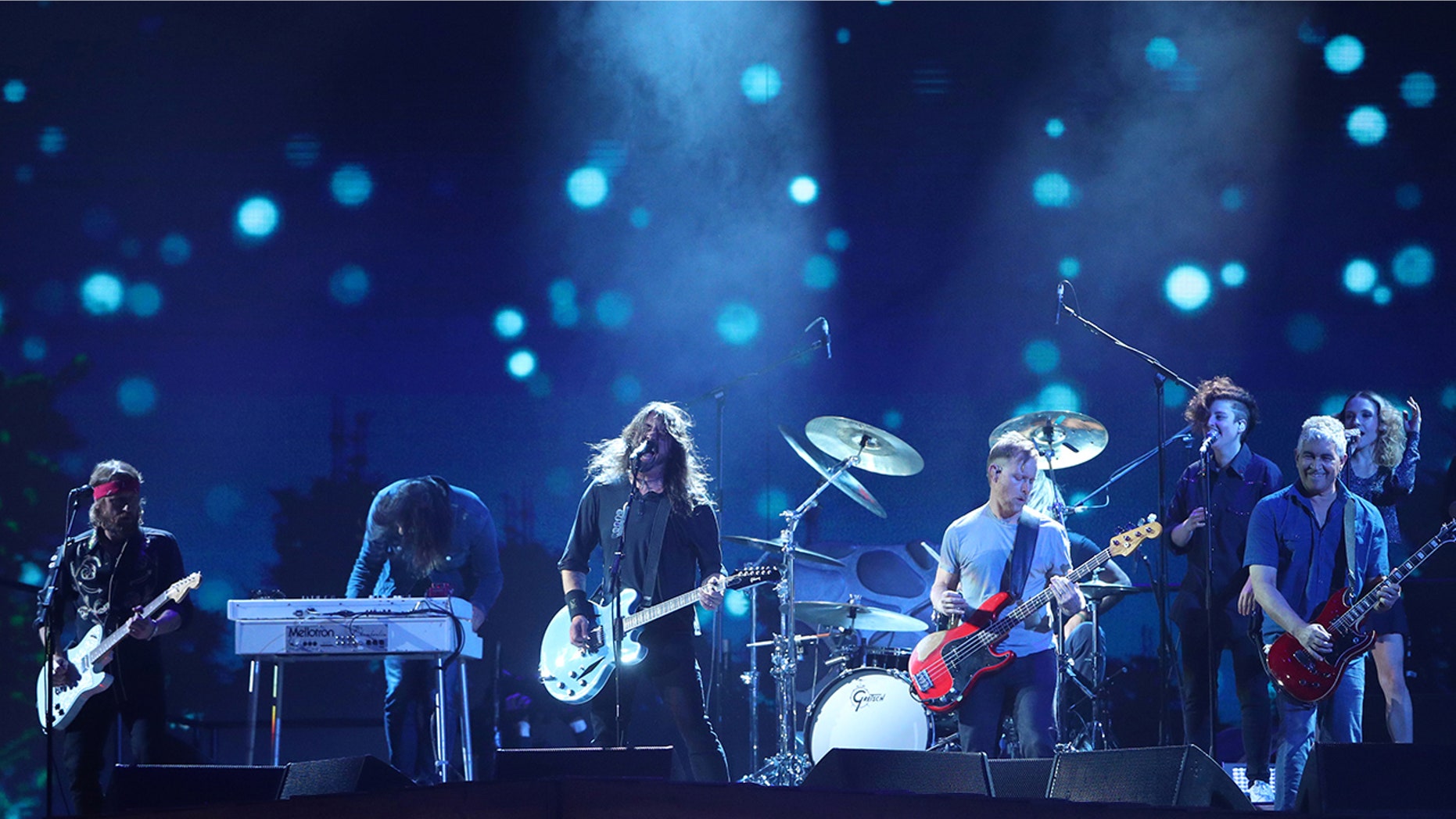 The Foo Fighters played a pickup soccer game with members of the University of Kentucky men's and women's soccer team.