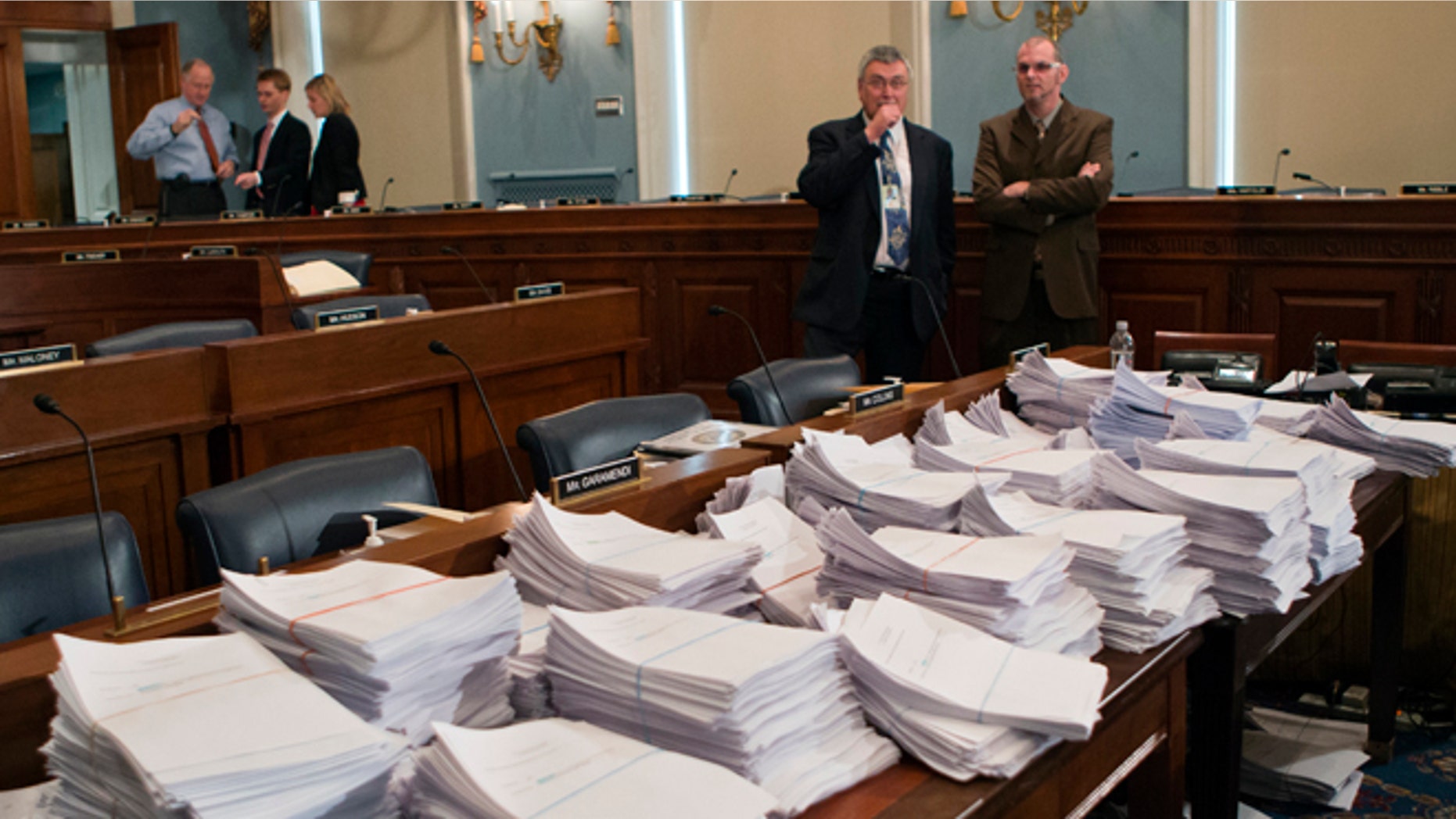 May 15, 2013: Stacks of paperwork await members of the House Agriculture Committee, on Capitol Hill in Washington, as it meets to consider proposals to the 2013 Farm Bill, including small cuts to the $80 billion-a-year food stamp program in an effort to appease conservatives who say the food aid has become too expensive.
